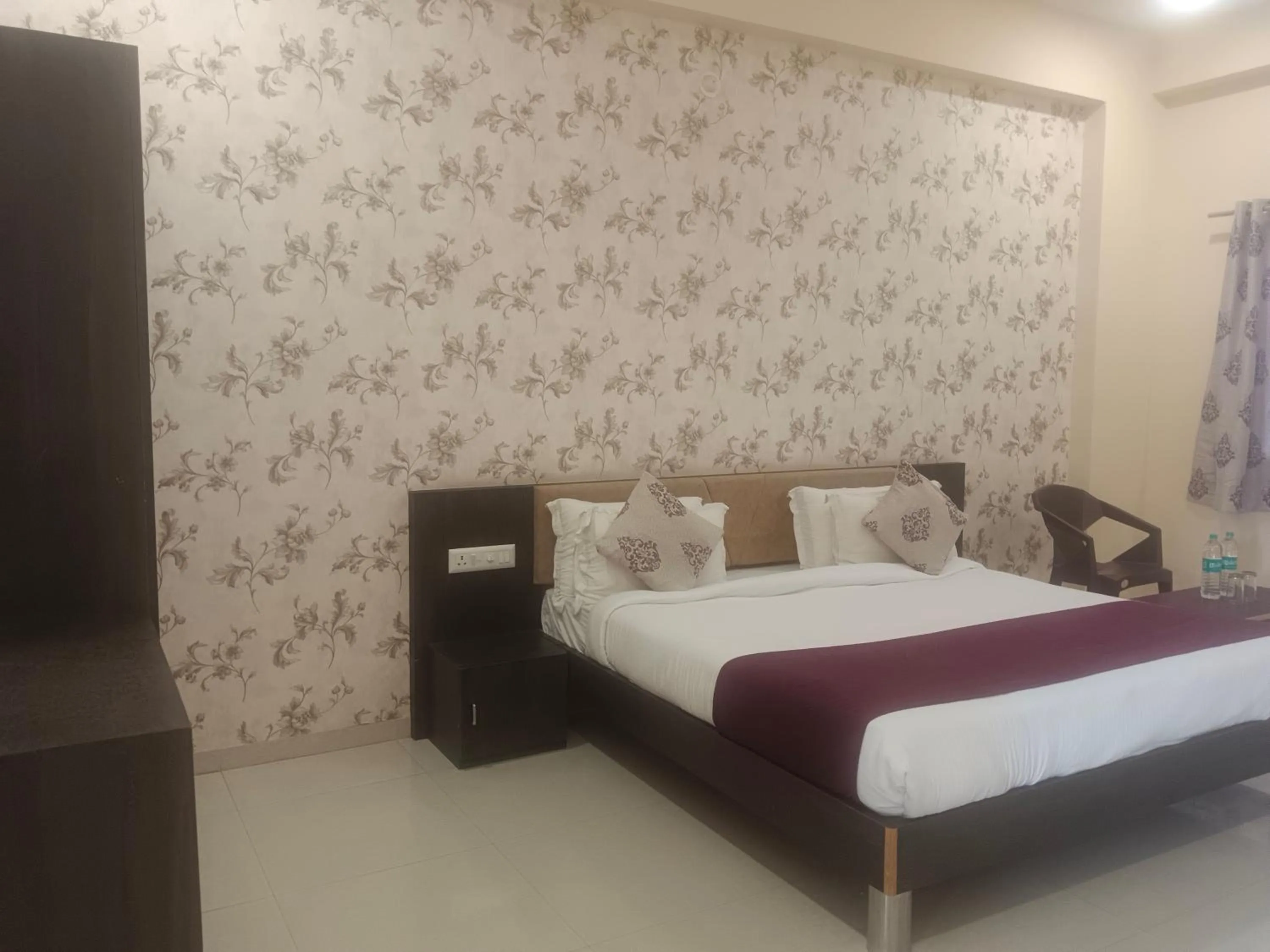 Bed in Vijayam Resort