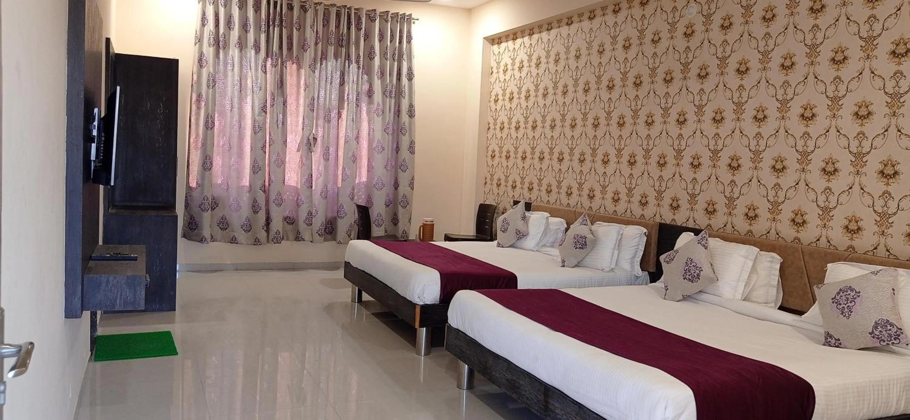 Bed in Vijayam Resort