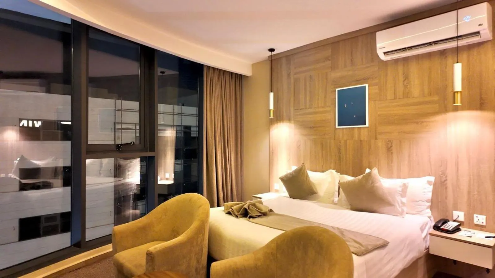 Bed in Twins Boutique Hotel