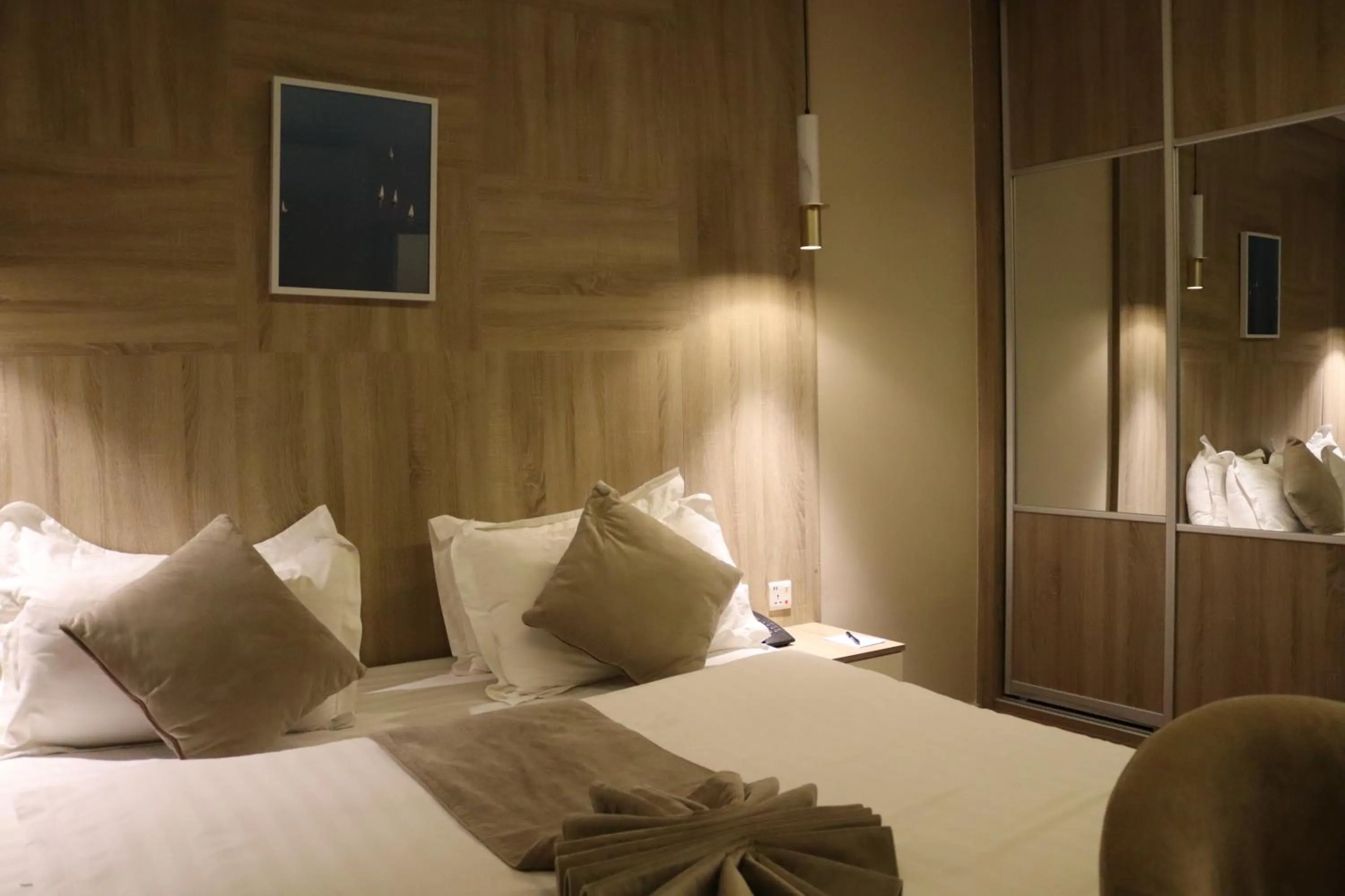 Bed in Twins Boutique Hotel