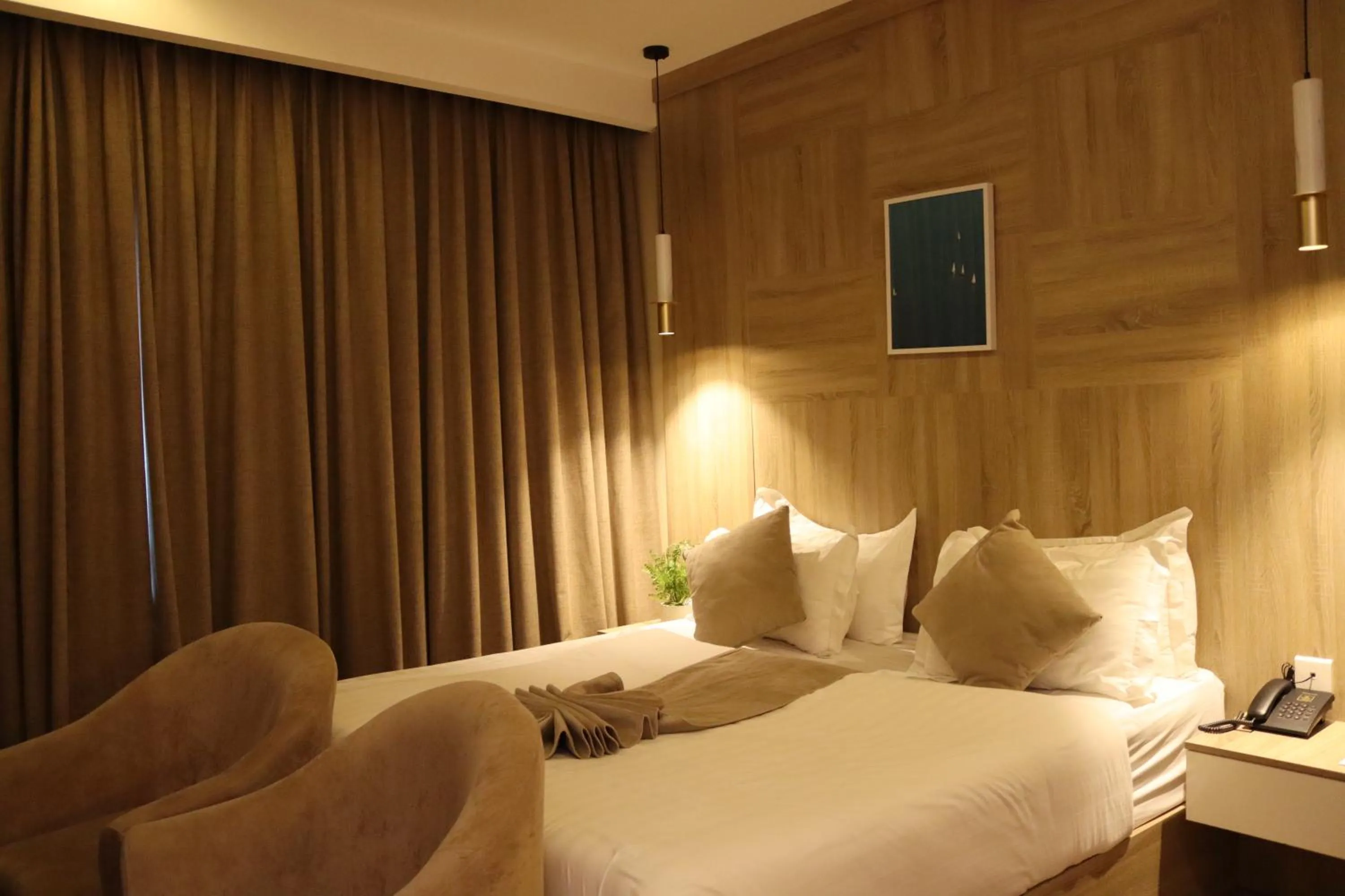 Bed in Twins Boutique Hotel