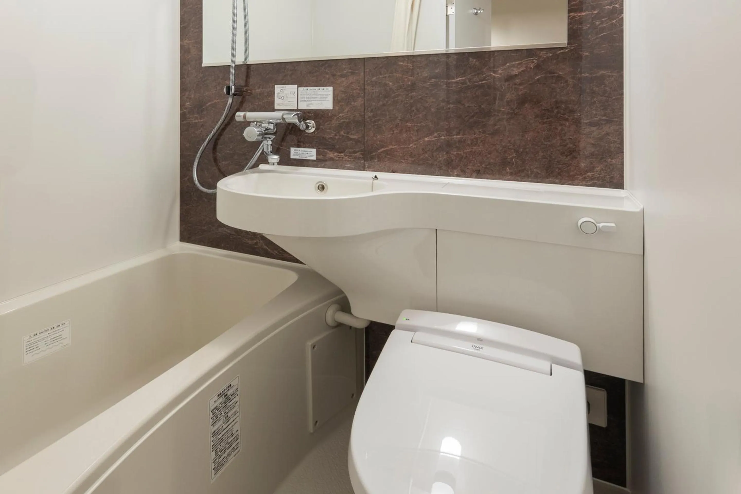 Toilet in Asta Hotel