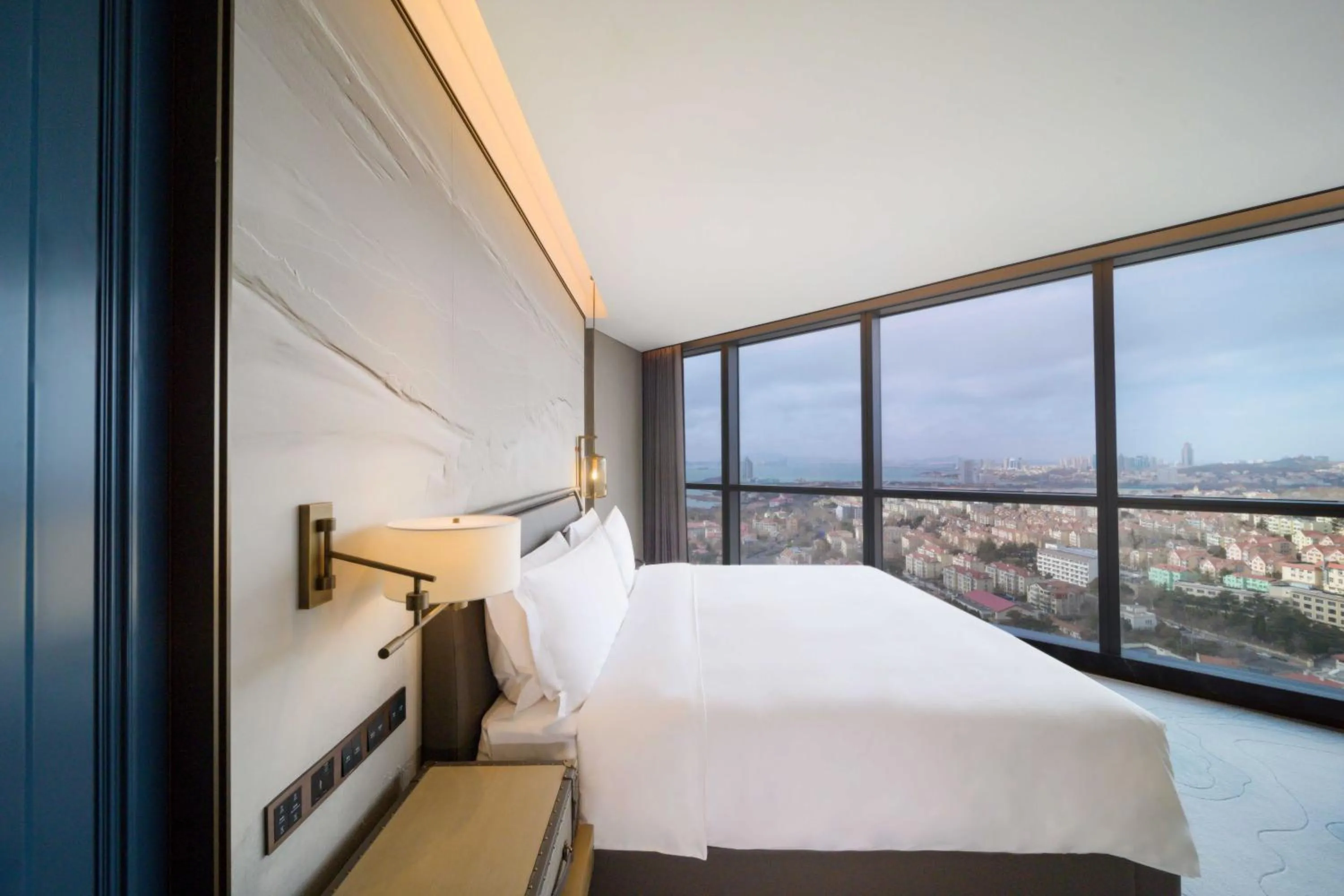 Bed in Qingdao Haitian Hotel