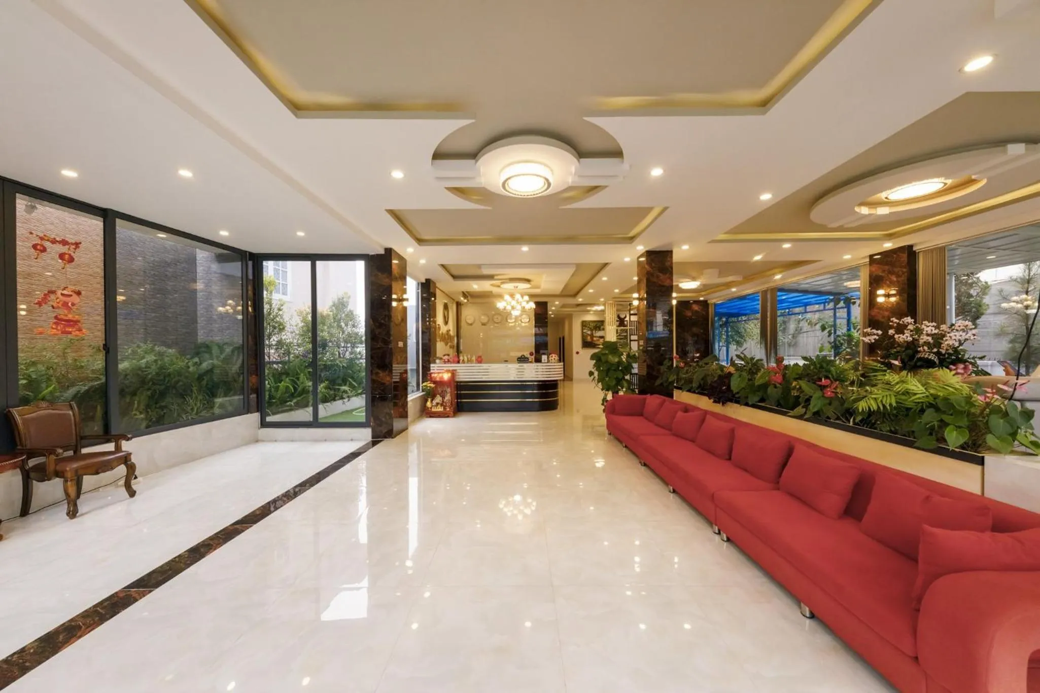 Communal lounge/ TV room in Bonjour Da Lat Hotel