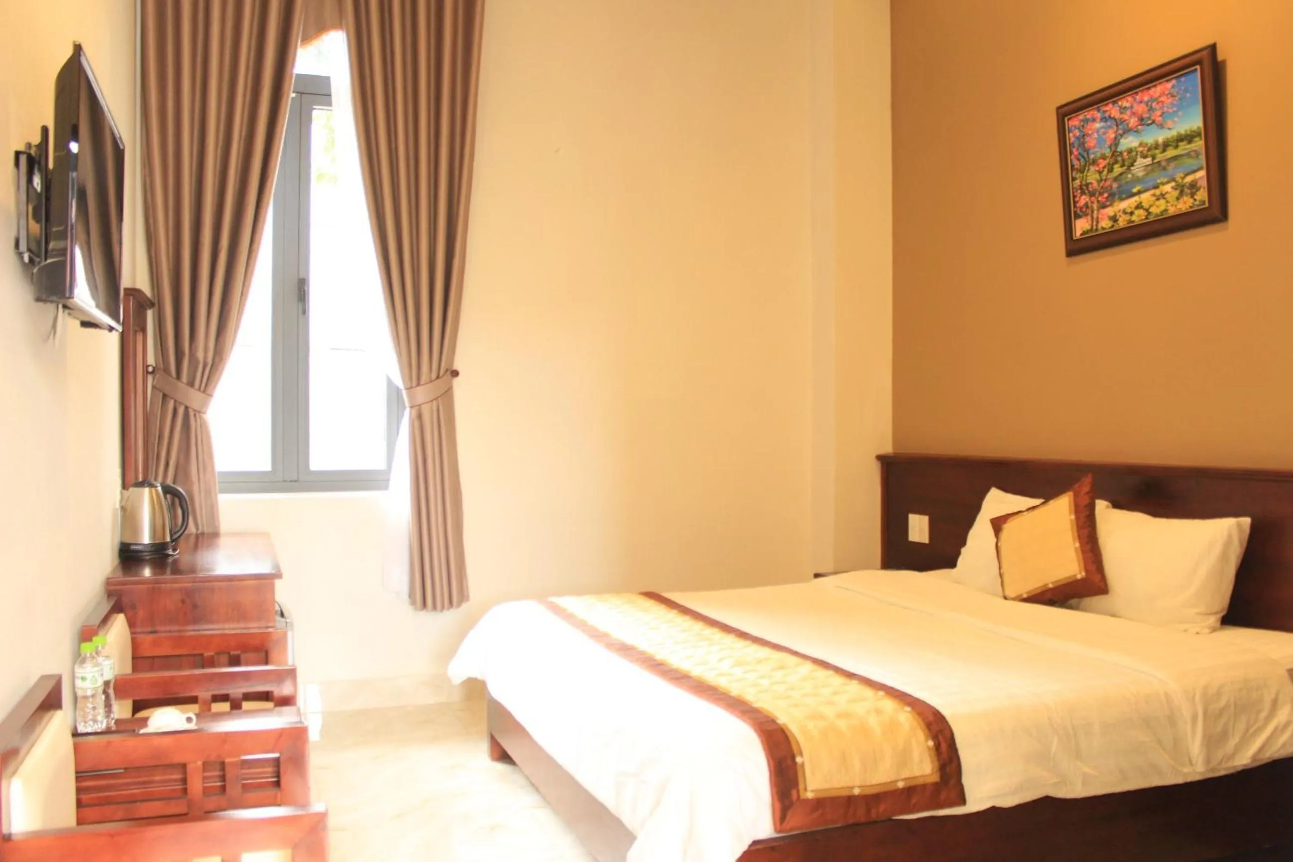 Bed in Bonjour Da Lat Hotel