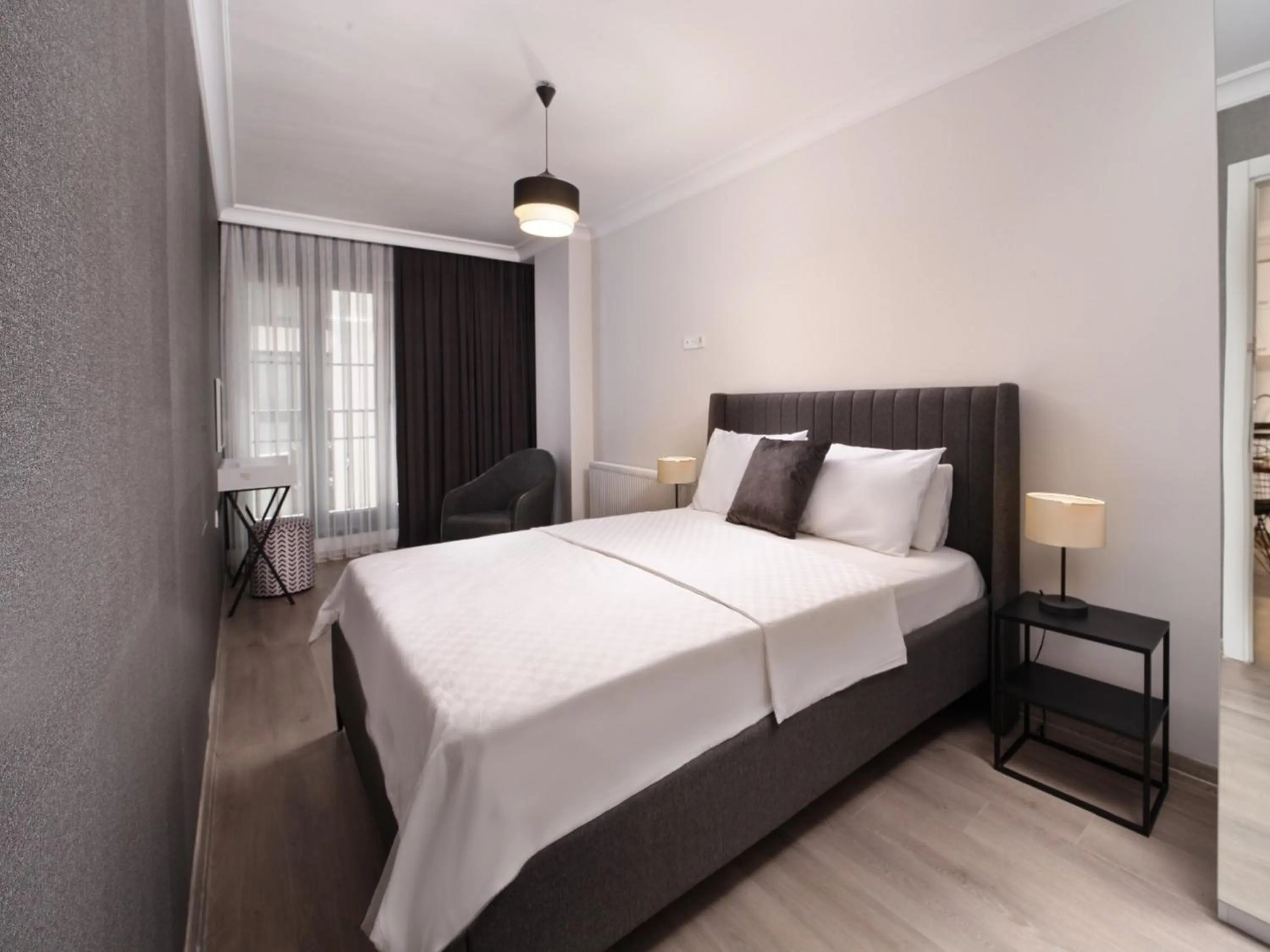 Bed in Etiz Hotels & Residences