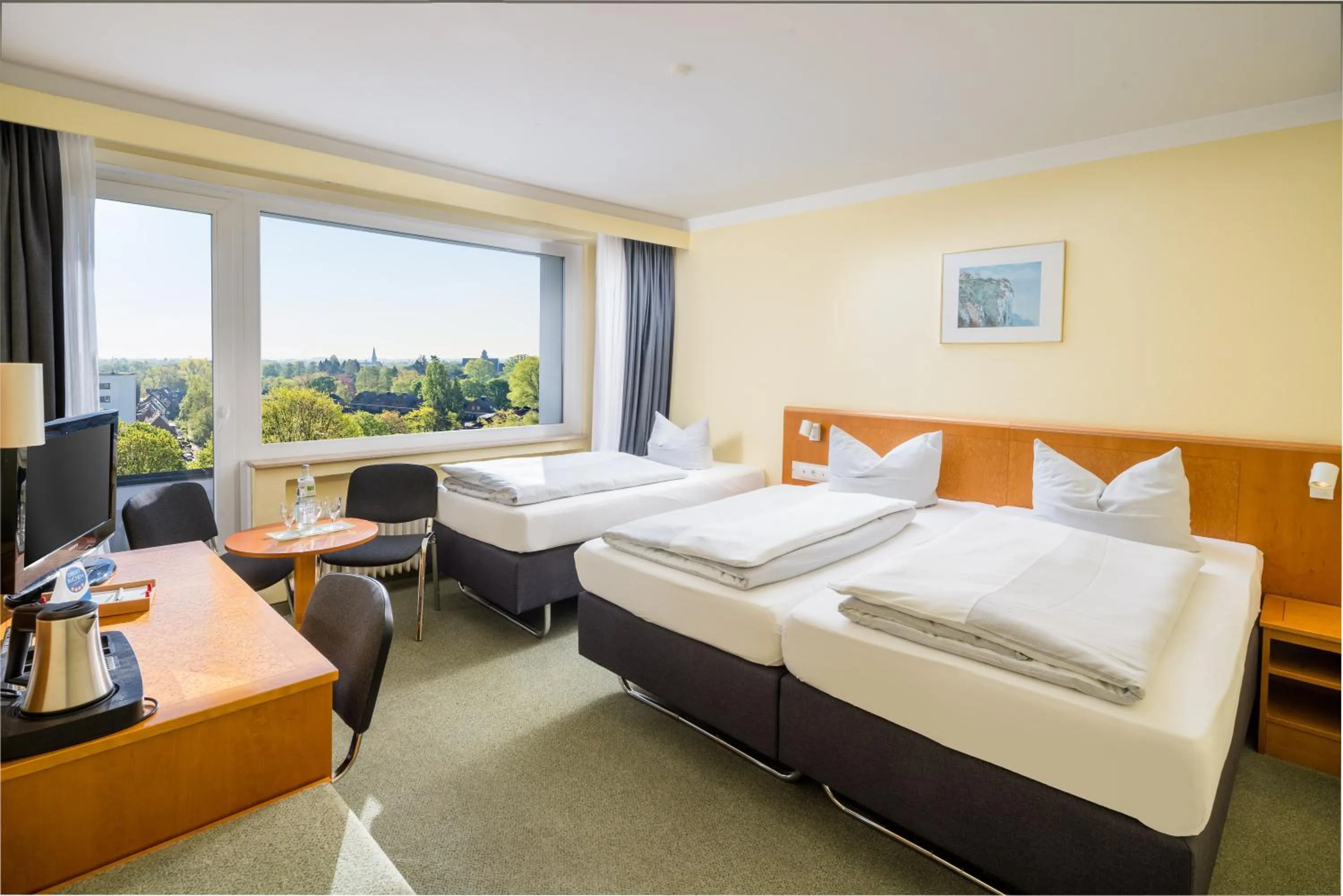 Photo of the whole room, Bed in Garden Hotel Krefeld