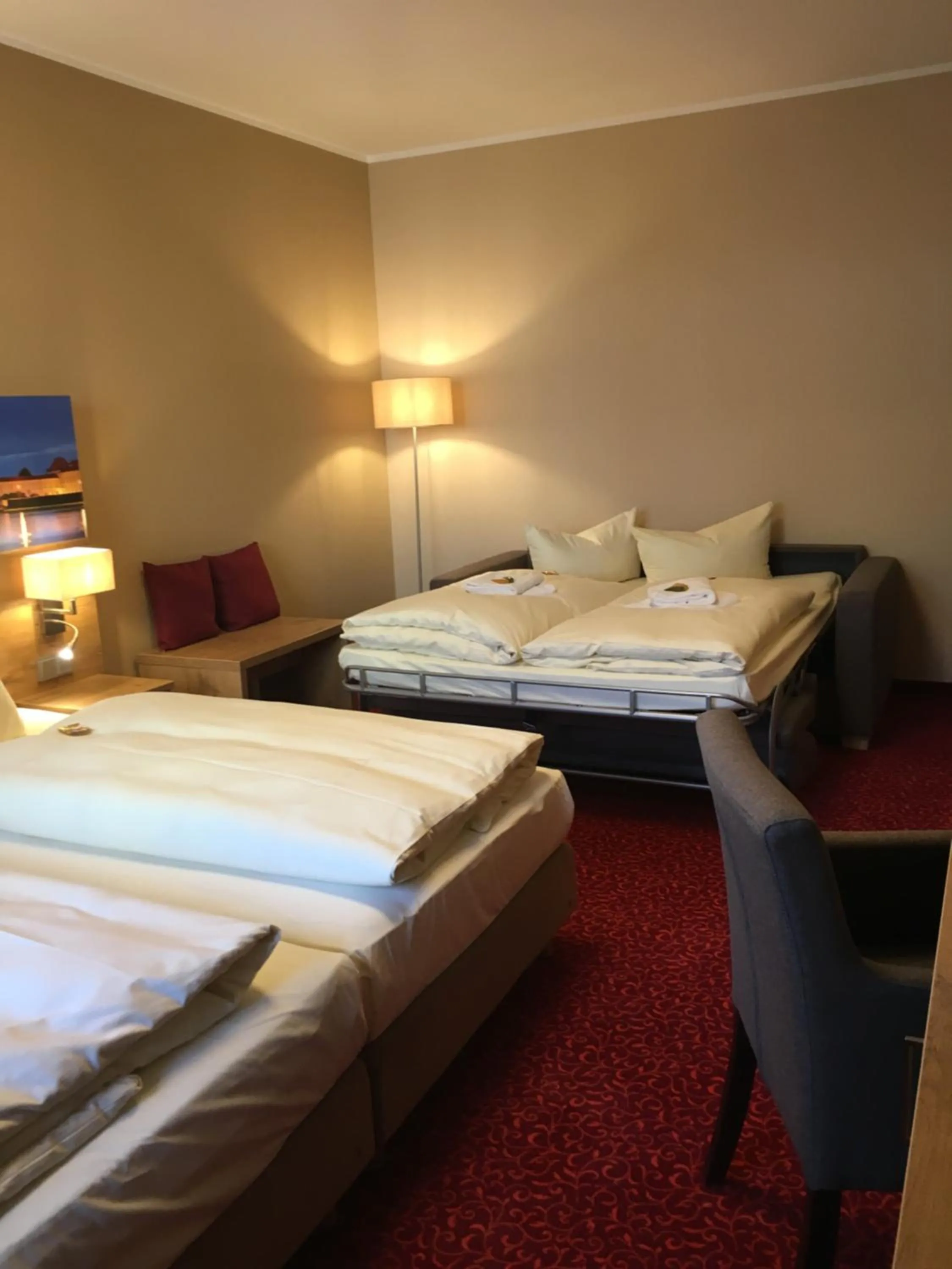 Photo of the whole room, Bed in Parkhotel Leiser