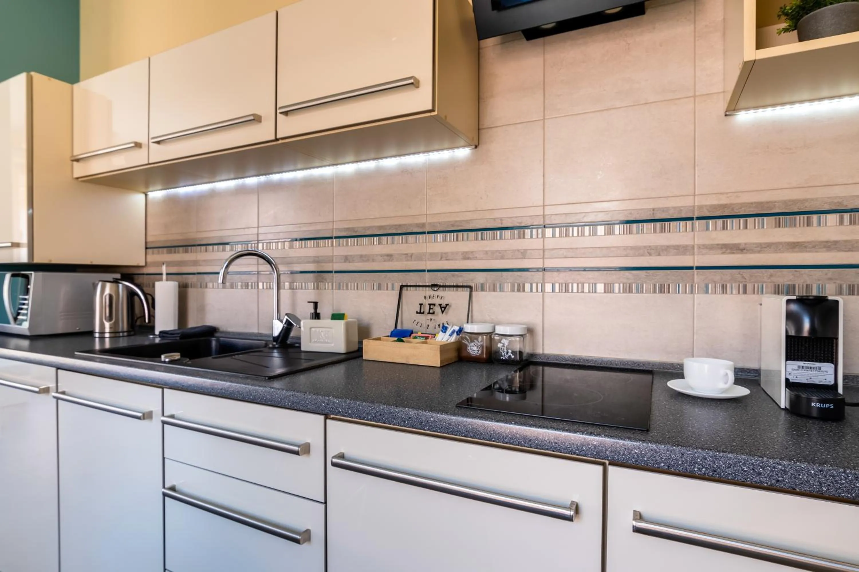 Kitchen or kitchenette in Apartamenty Prestige Browar Lubicz Stare Miasto