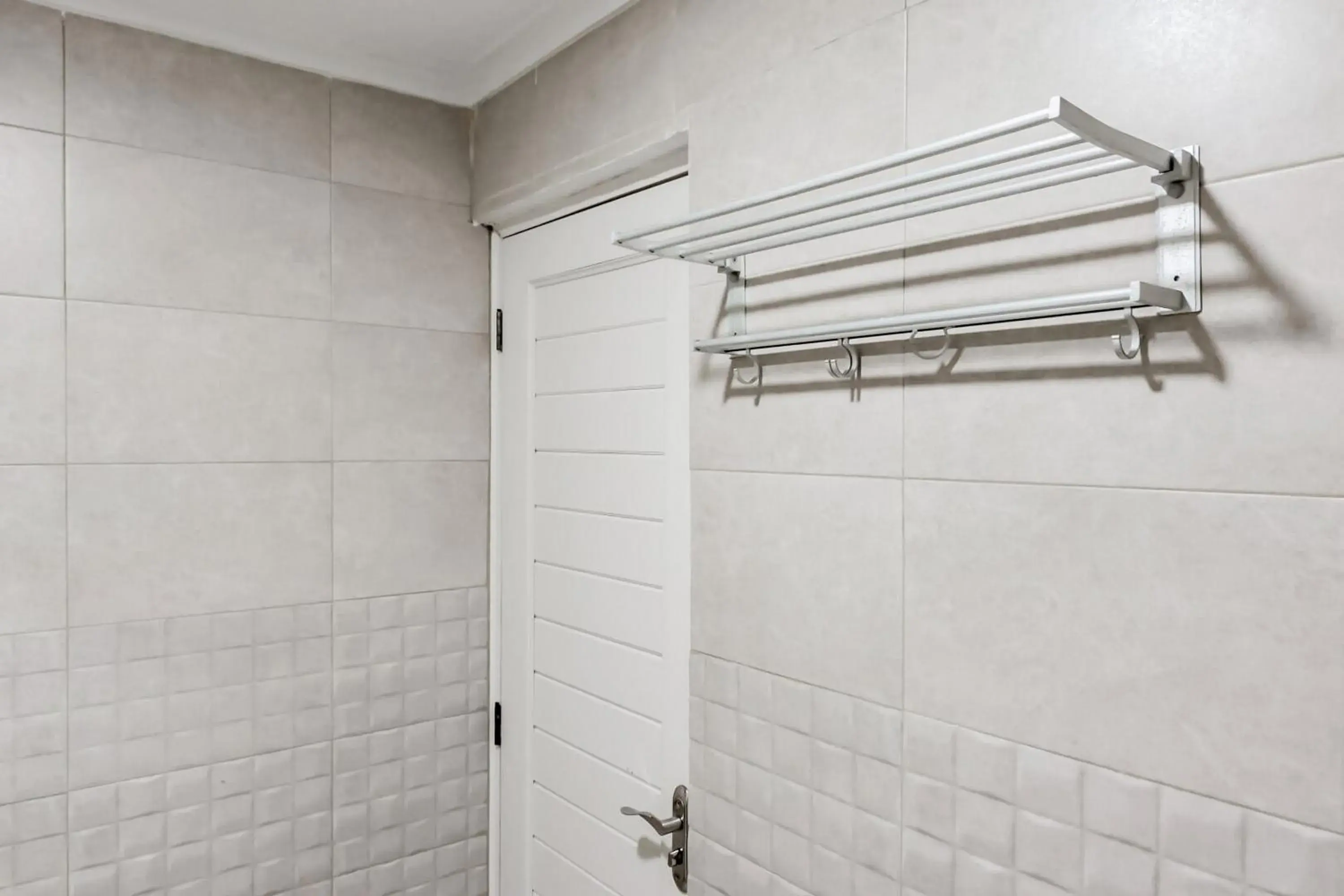 Bathroom in RedDoorz Plus near Lembang Park & Zoo Bathroom in RedDoorz Plus near Lembang Park & Zoo