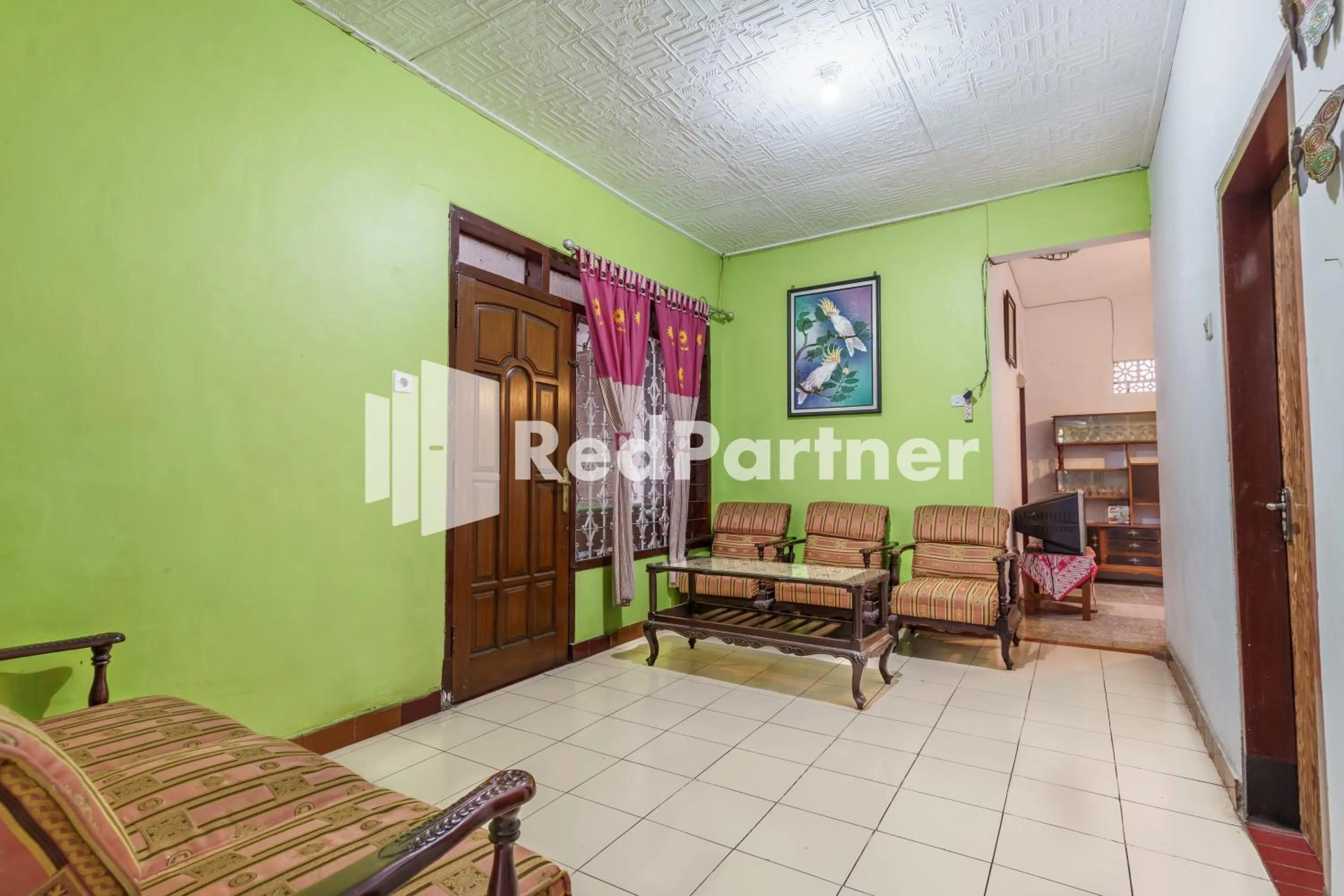 Seating area in Nafisa Homestay Syariah Near Jatim Park 3 Batu Mitra RedDoorz