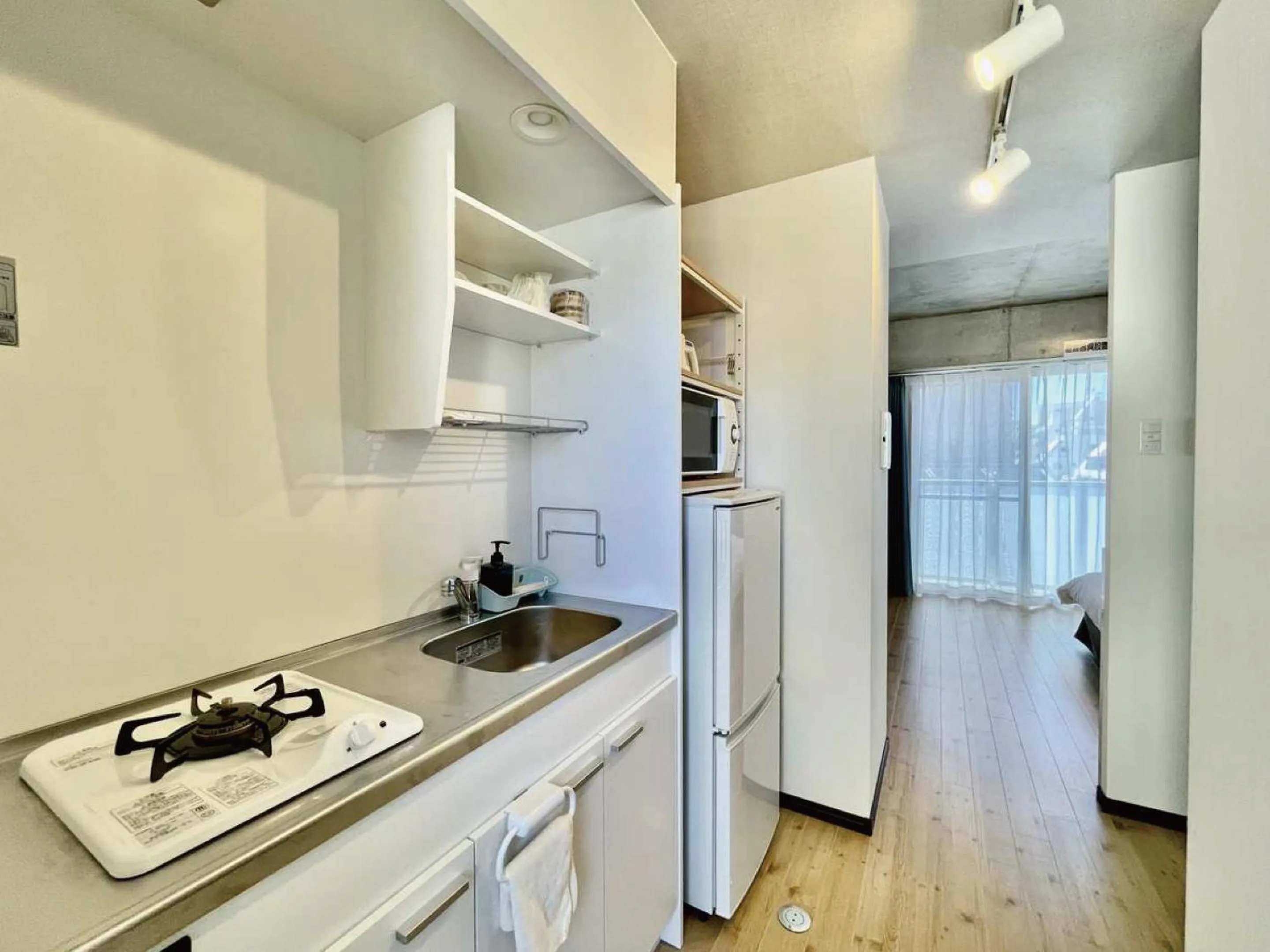 Kitchen or kitchenette in Infinity Hotel NahaKumoji -SEVEN Hotels and Resorts-