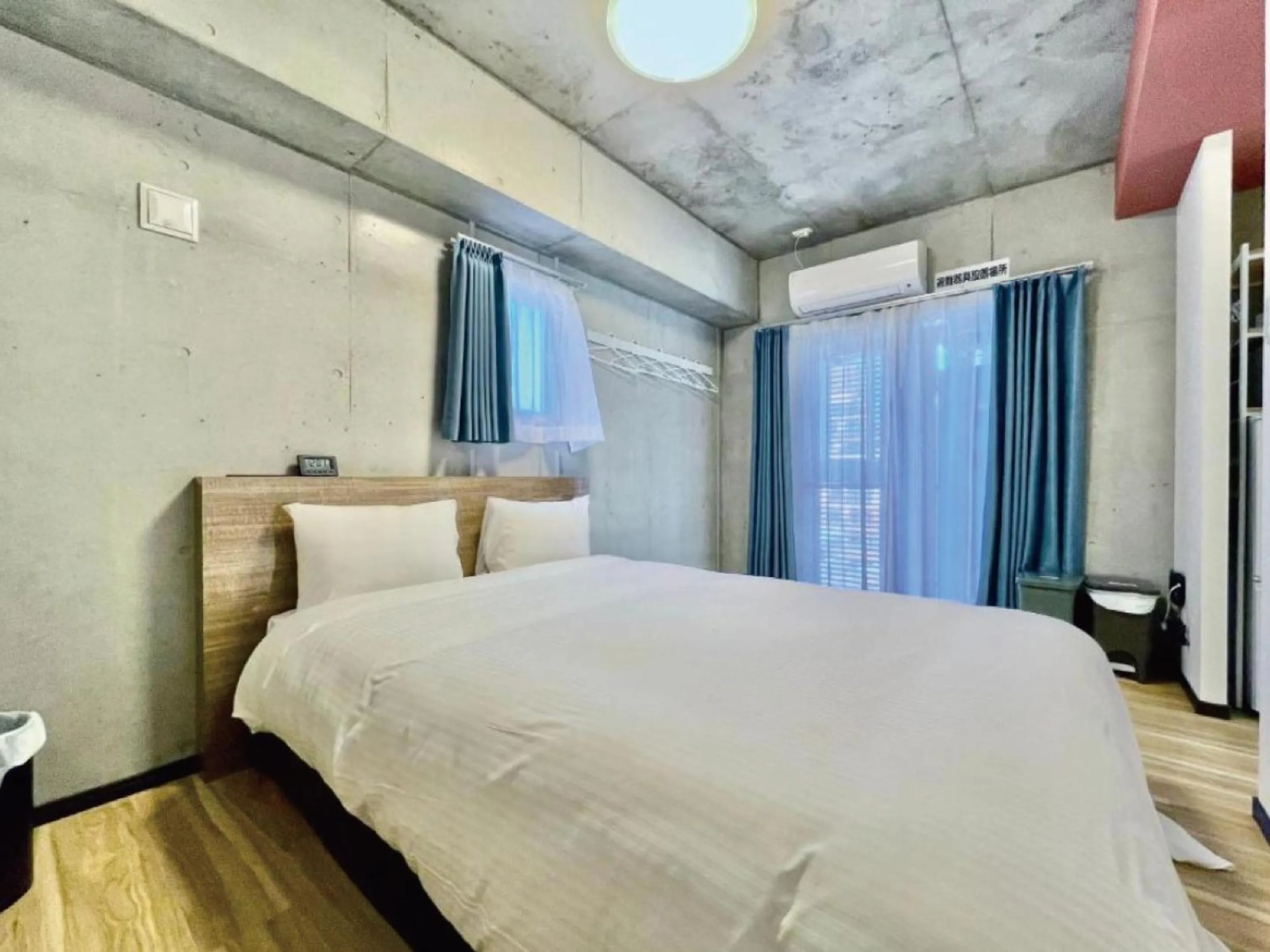 Bed in Infinity Hotel NahaKumoji -SEVEN Hotels and Resorts-