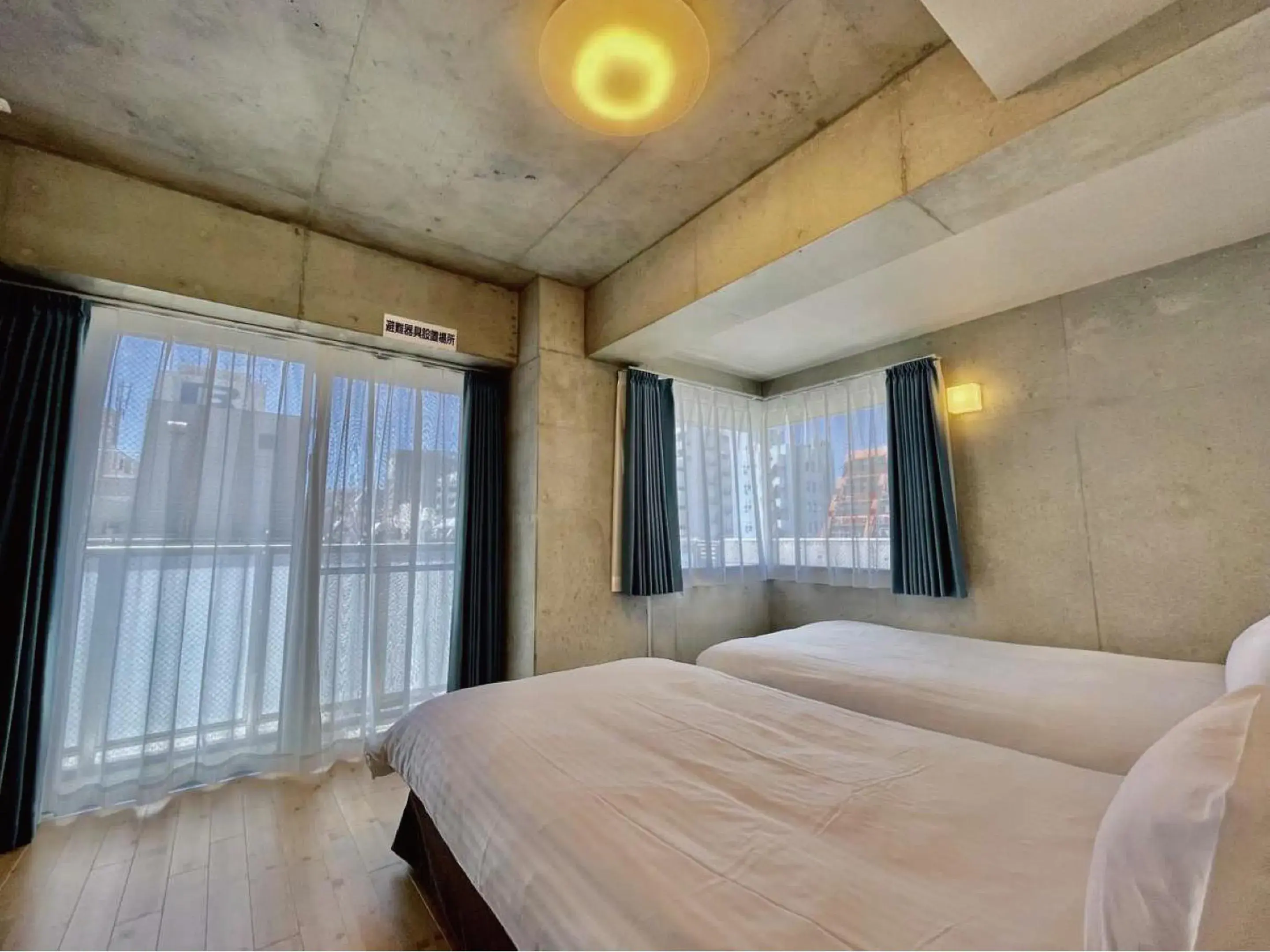 Bed in Infinity Hotel NahaKumoji -SEVEN Hotels and Resorts- Bed in Infinity Hotel NahaKumoji -SEVEN Hotels and Resorts-