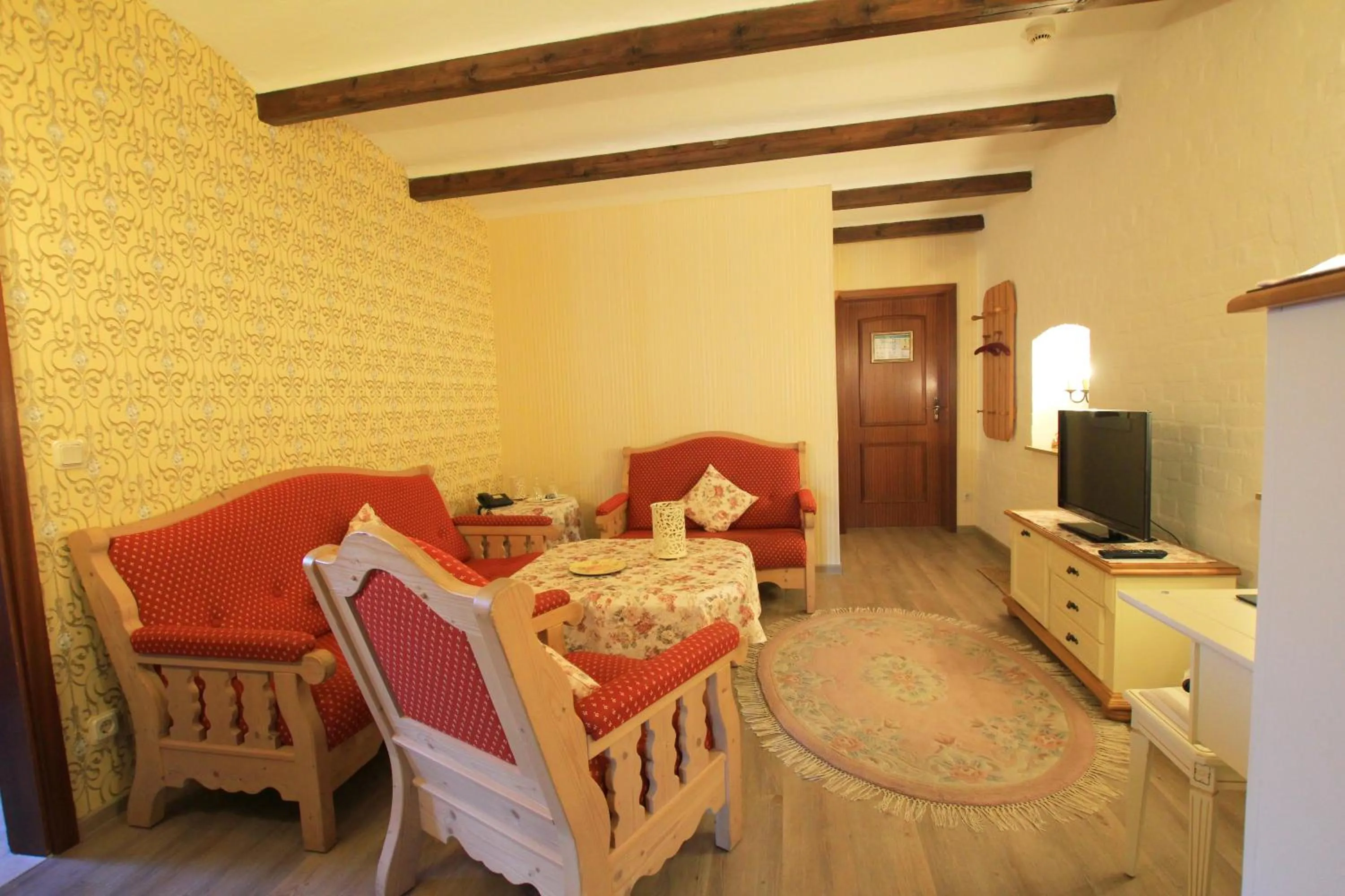 Photo of the whole room, Bed in Landhaus Hotel Romantik