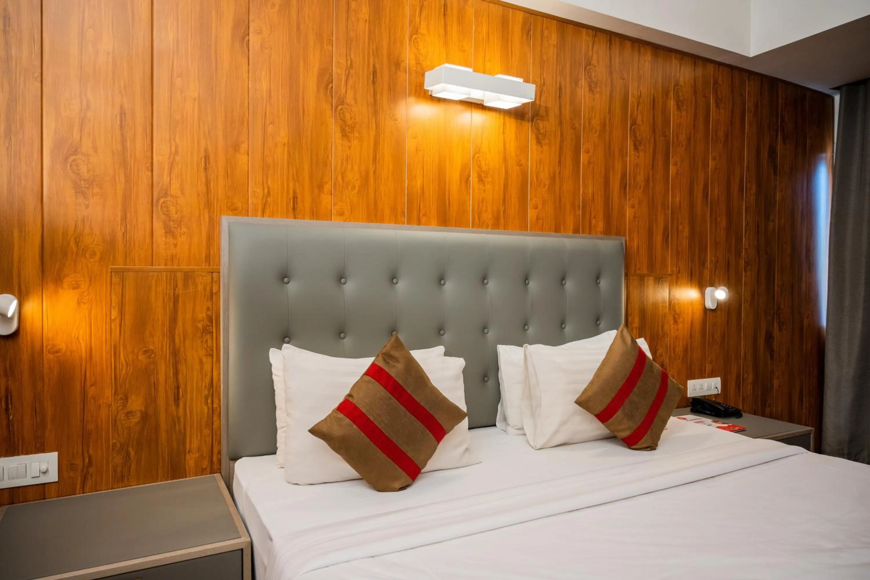 Bed in Hotel Asrani International