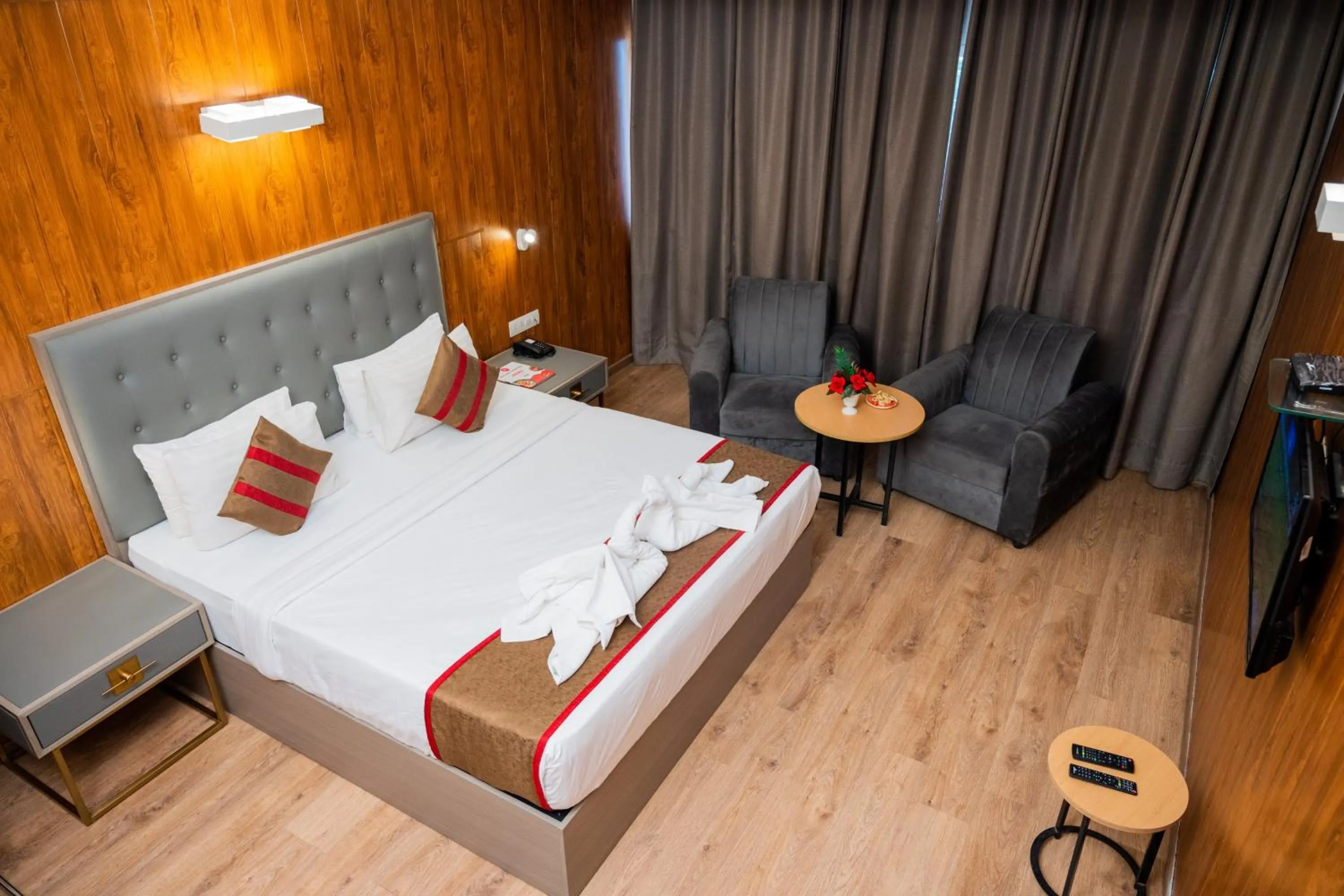 Bed in Hotel Asrani International