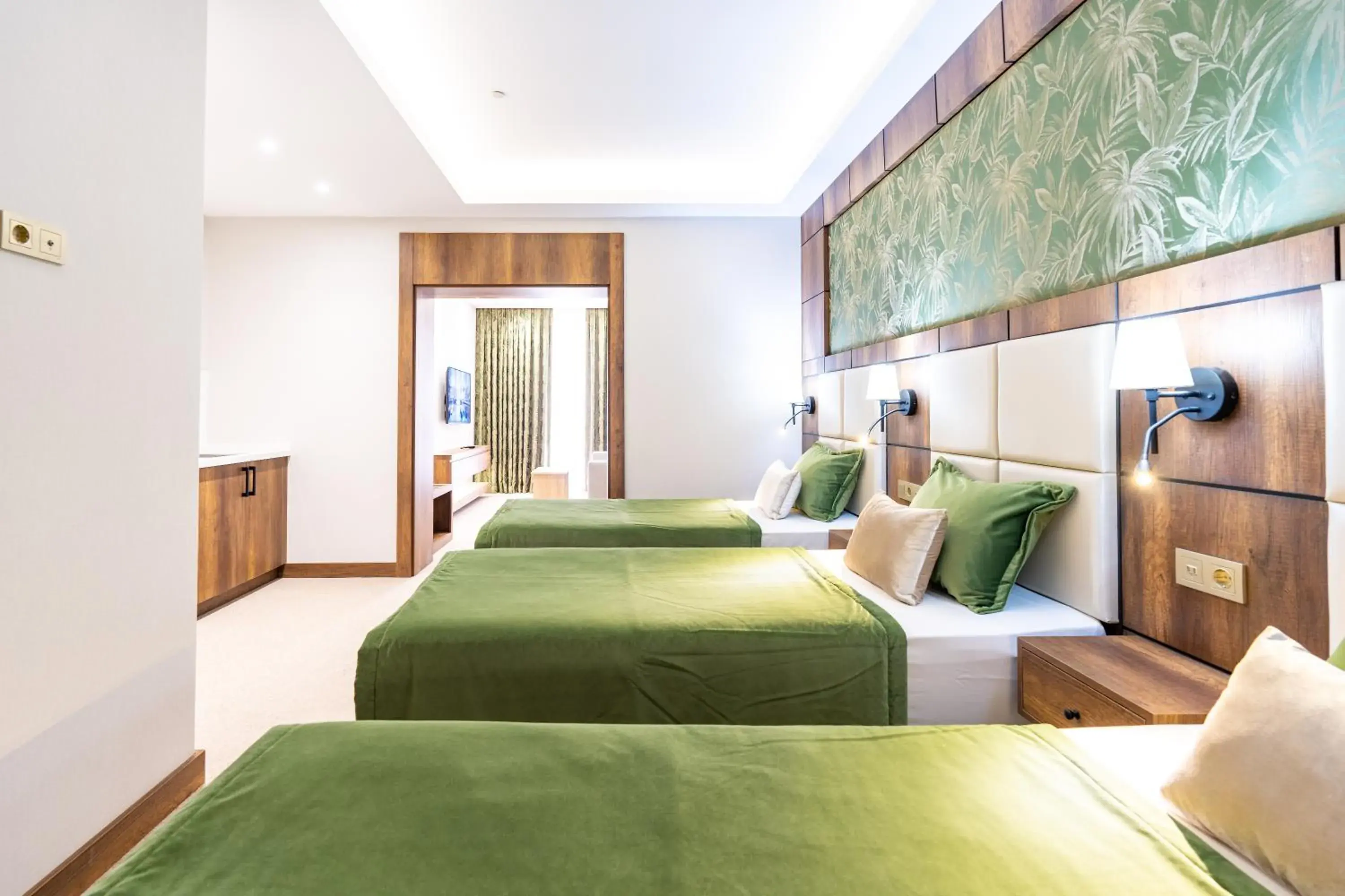 Bed in Mardy Suit Hotel Bed in Mardy Suit Hotel