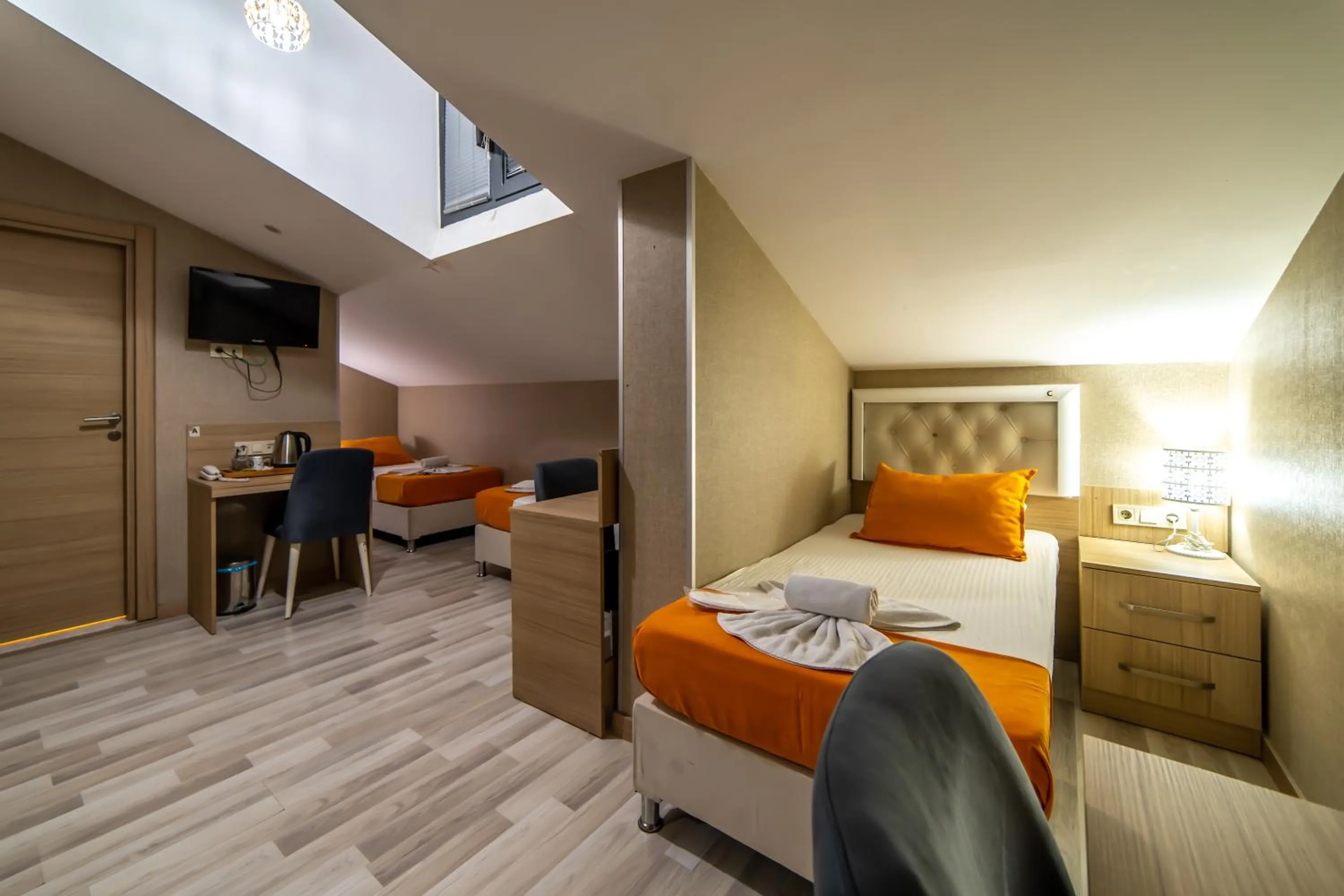 Bed in Mardy Suit Hotel