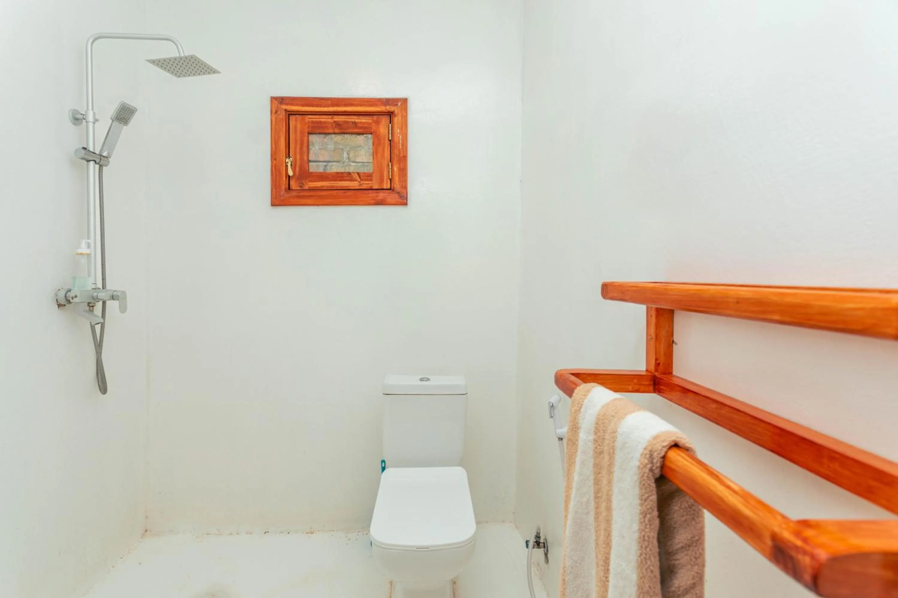 Toilet in TIKI Beach Club & Resort