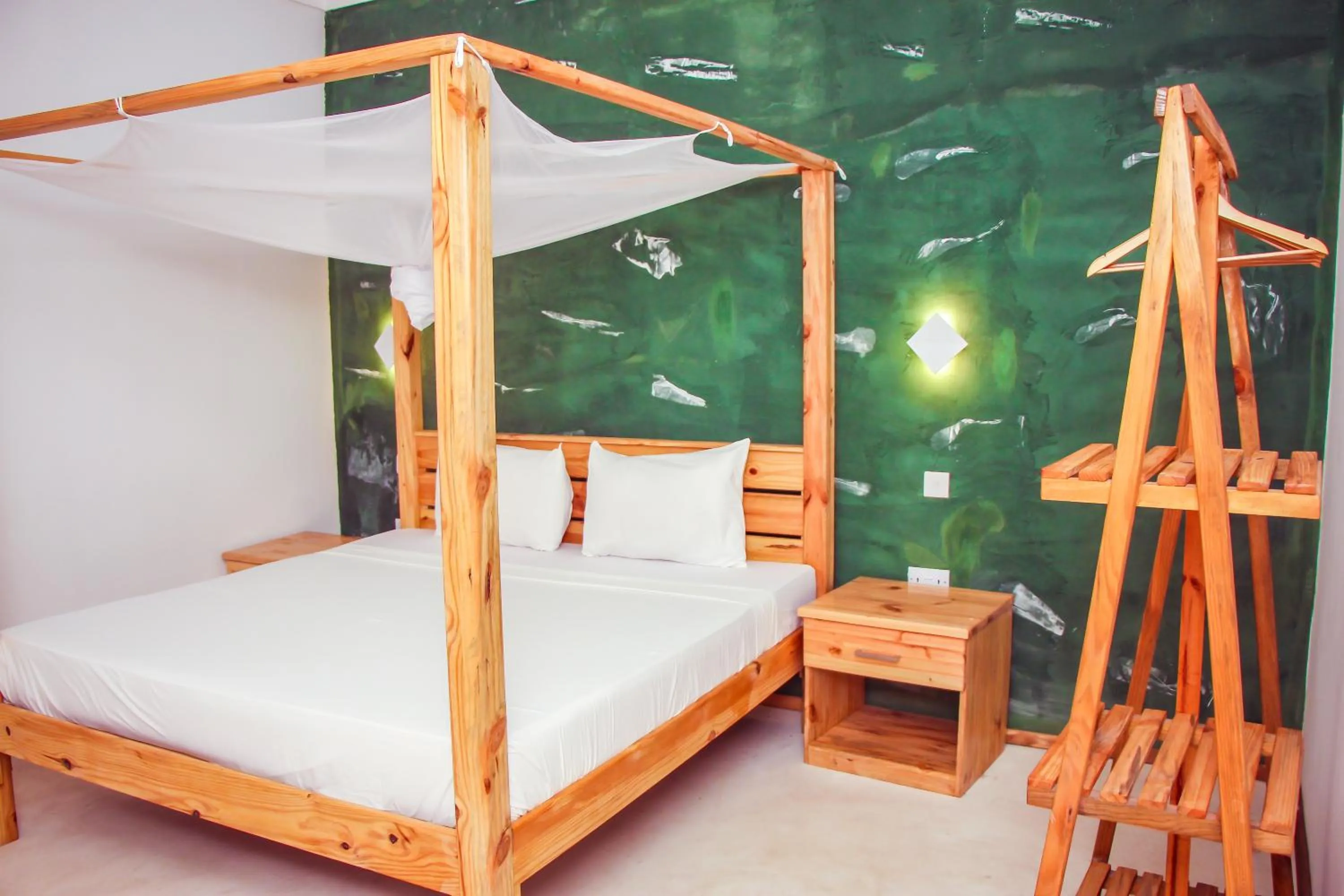 Bed in TIKI Beach Club & Resort