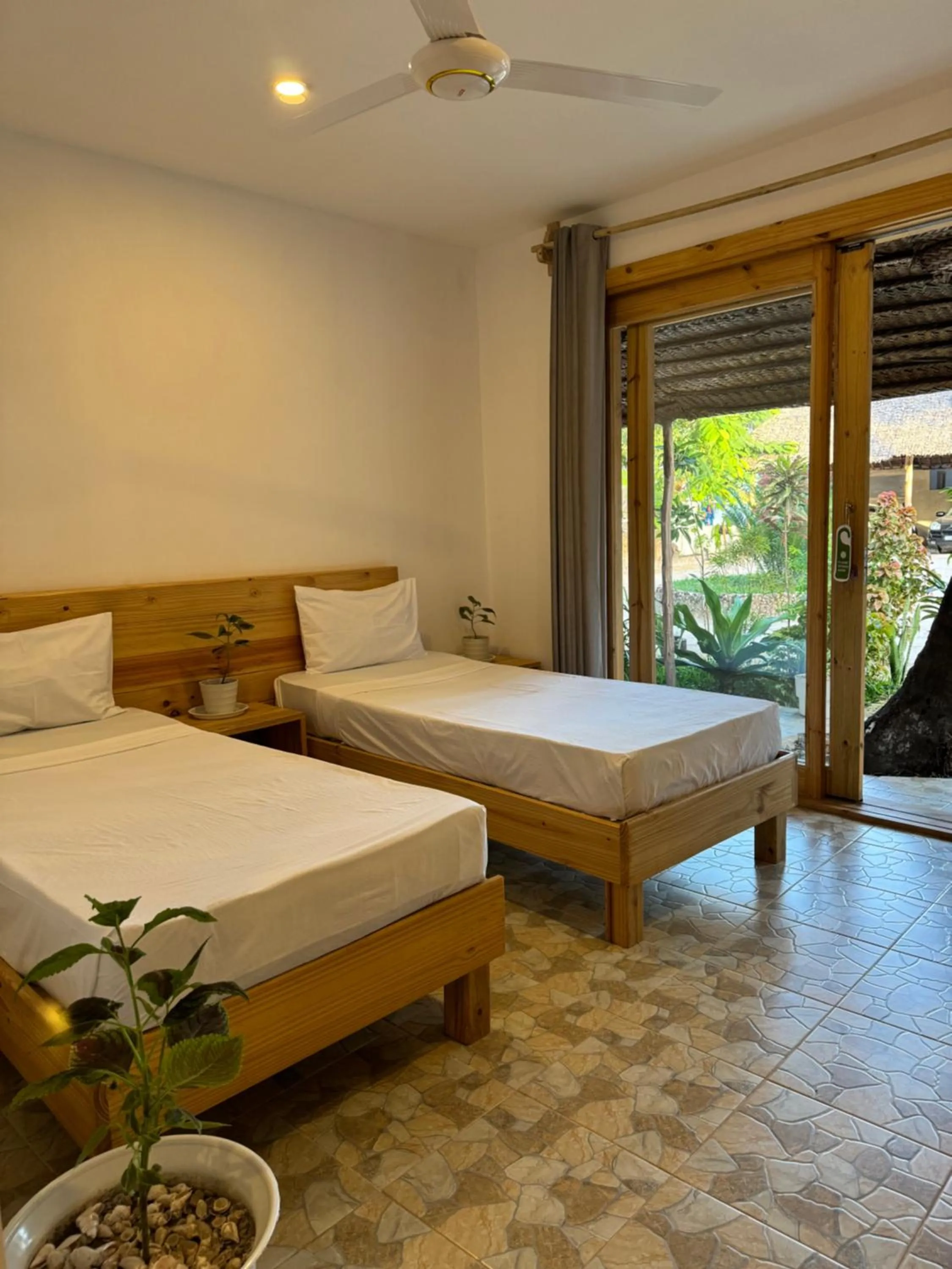 Bed in TIKI Beach Club & Resort