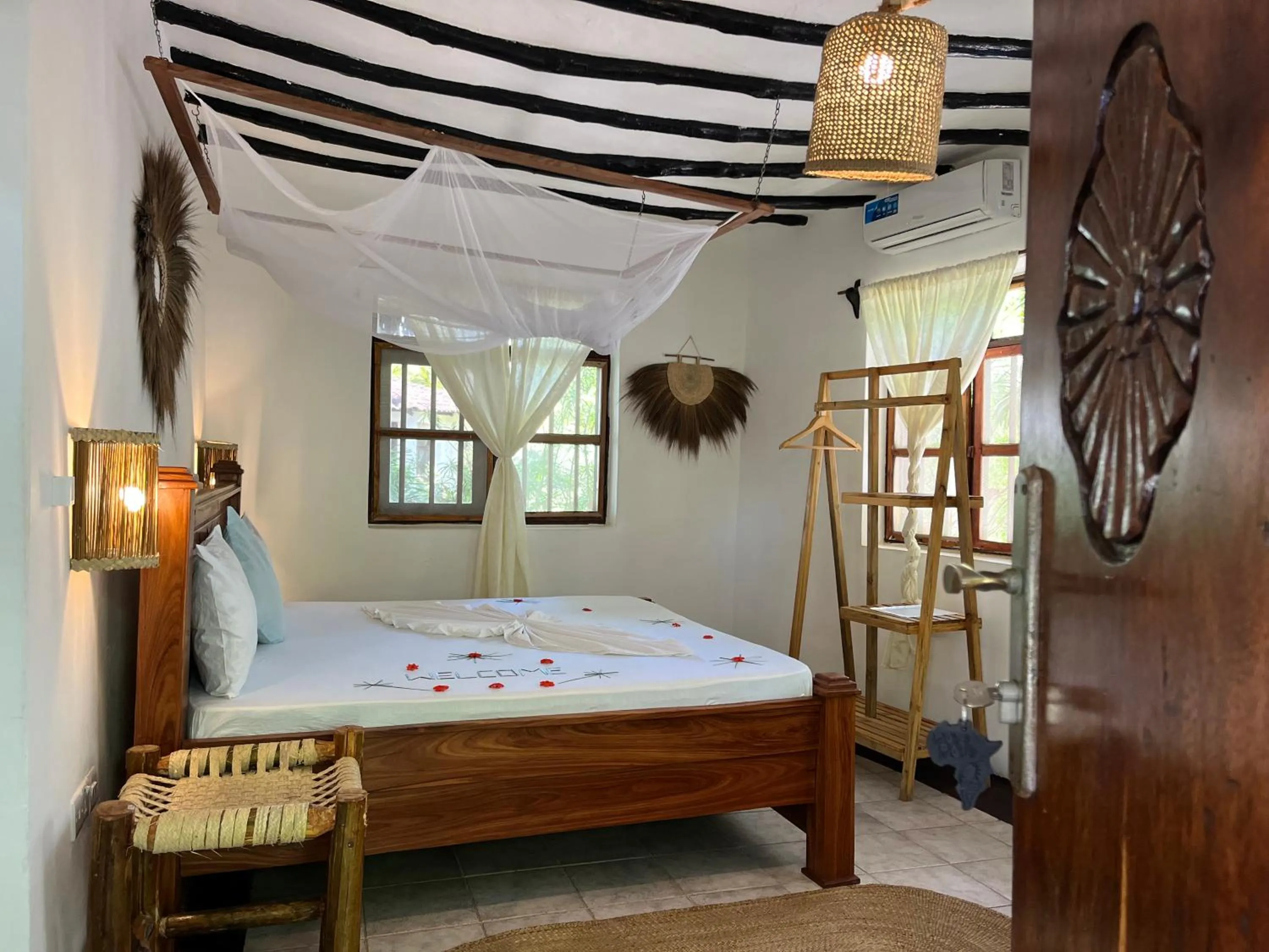 Bed in TIKI Beach Club & Resort