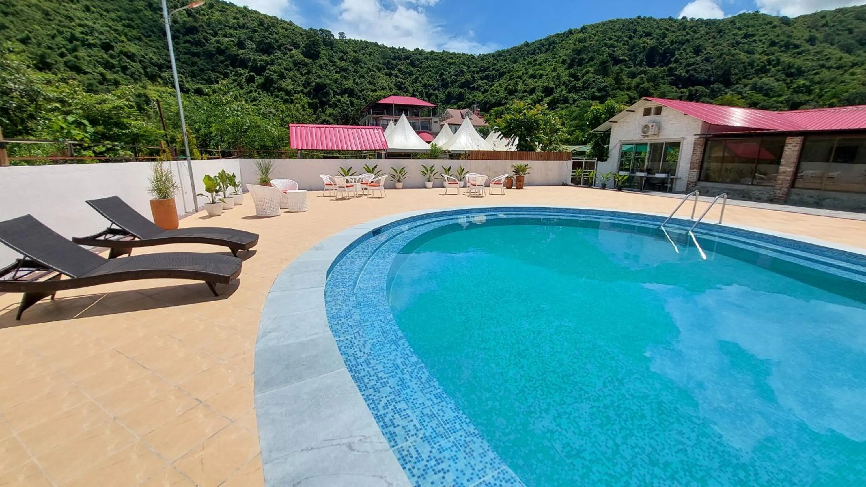 Swimming pool in Shalom Farmhouse by the hillside