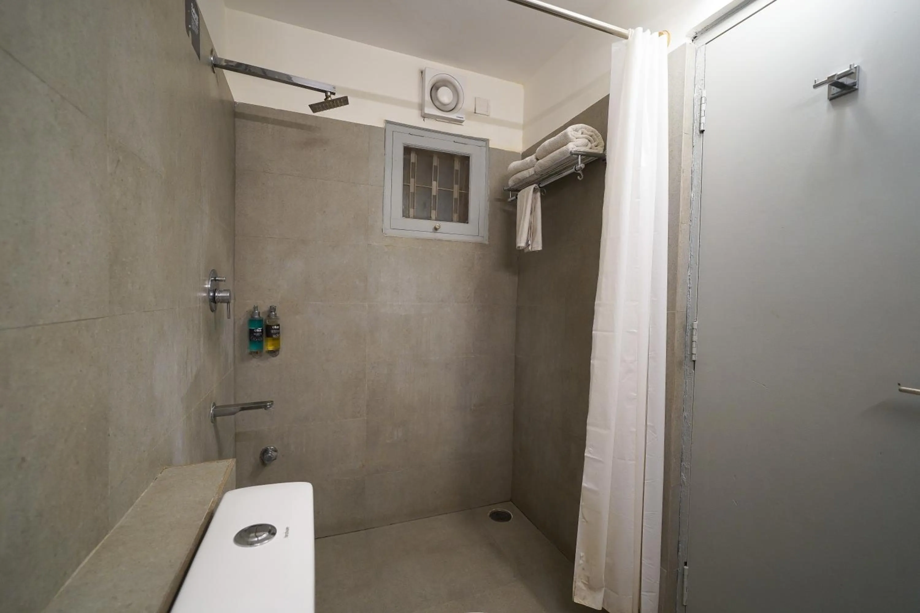 Bathroom in Olive Hotel Magrath by Embassy Group