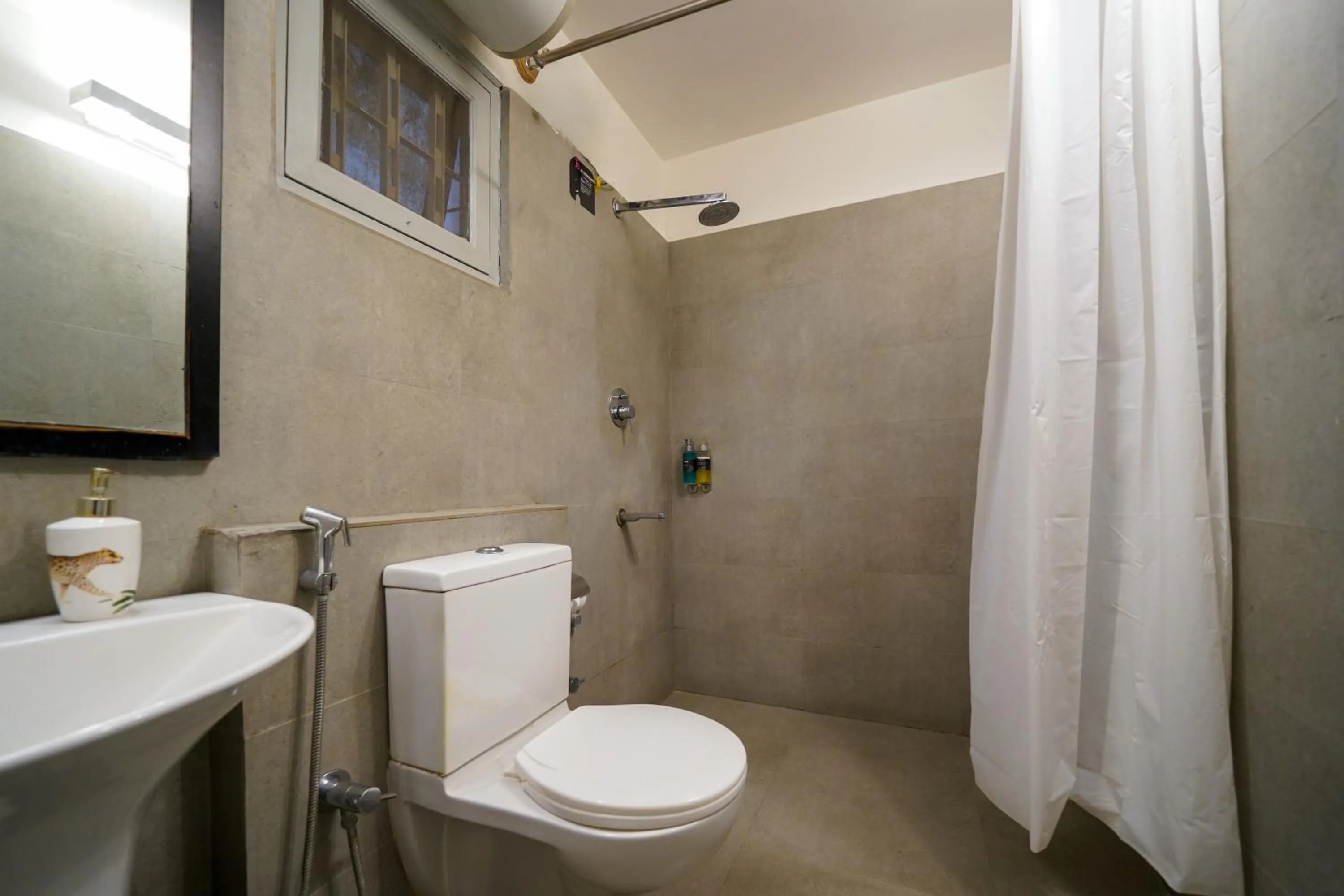 Bathroom in Olive Hotel Magrath by Embassy Group