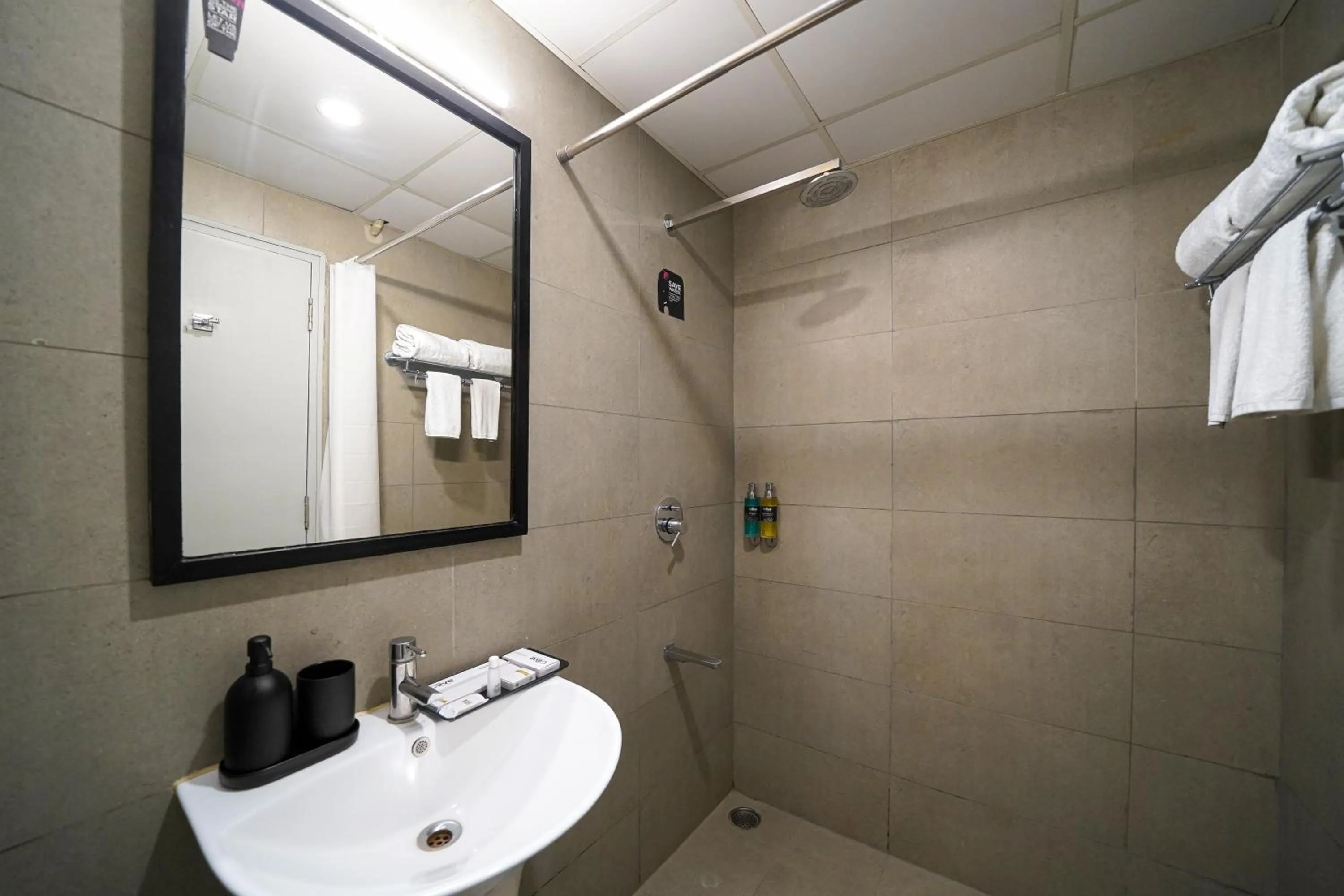 Bathroom in Olive Hotel Indiranagar by Embassy Group
