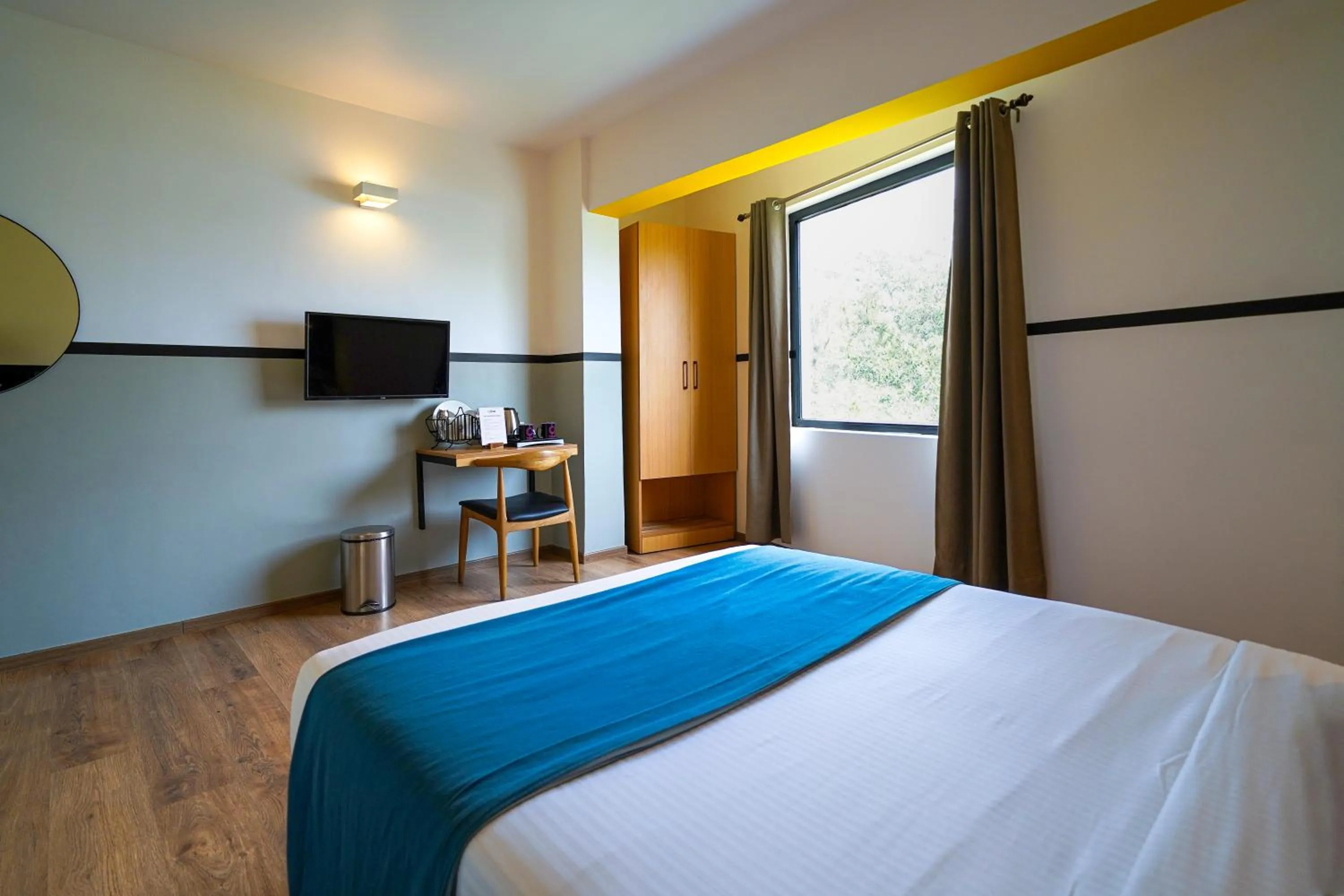 Bedroom, Bed in Olive Hotel Indiranagar by Embassy Group