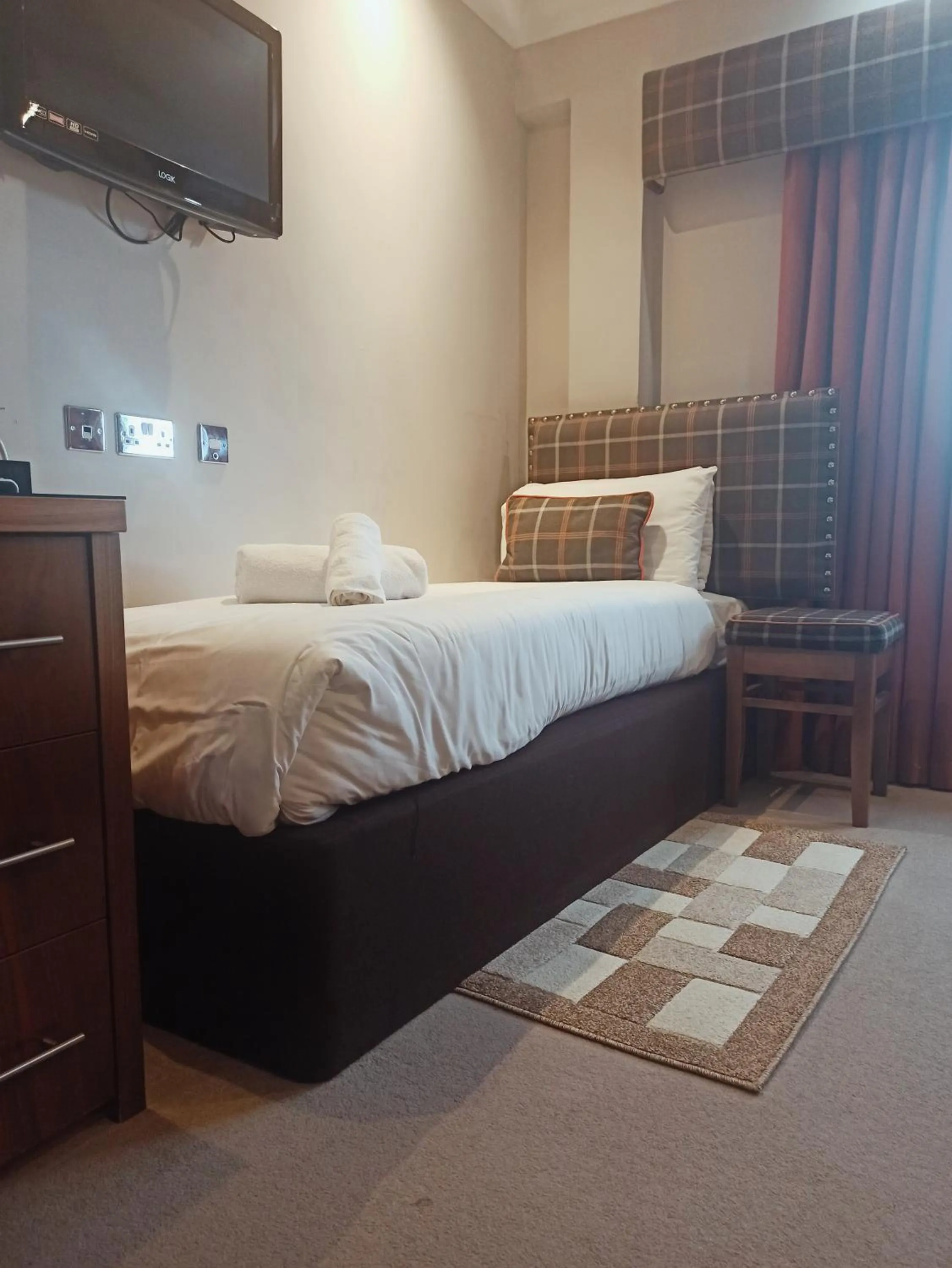 Bed in Anchor Hotel and Seabed Restaurant