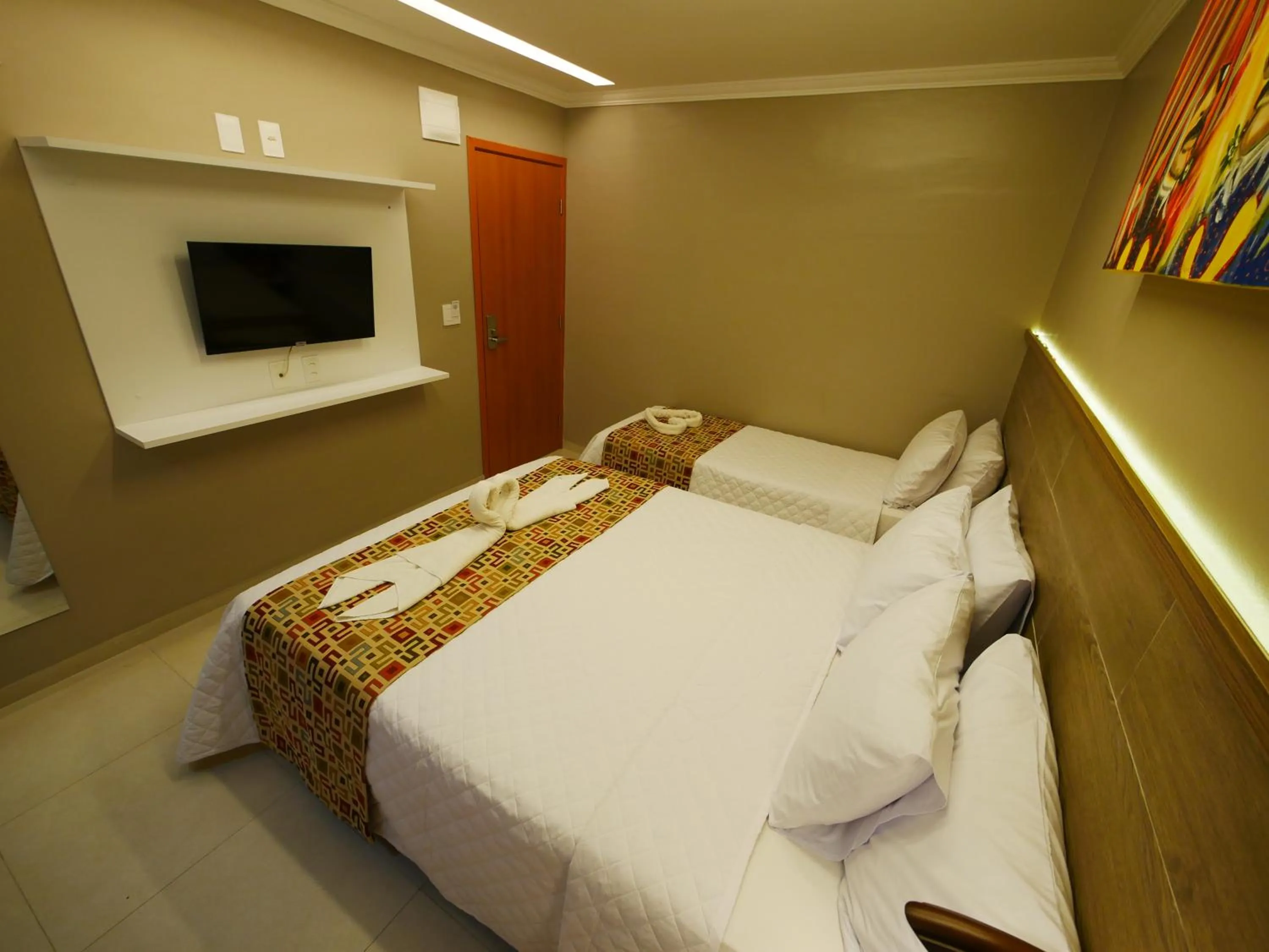 Bed in Pousada Recanto dos Corais