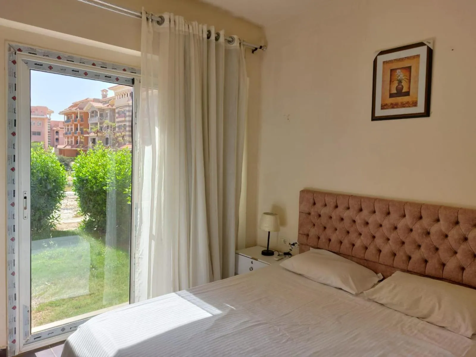 Bed in porto sharm 2 bed room and private garden-pool view