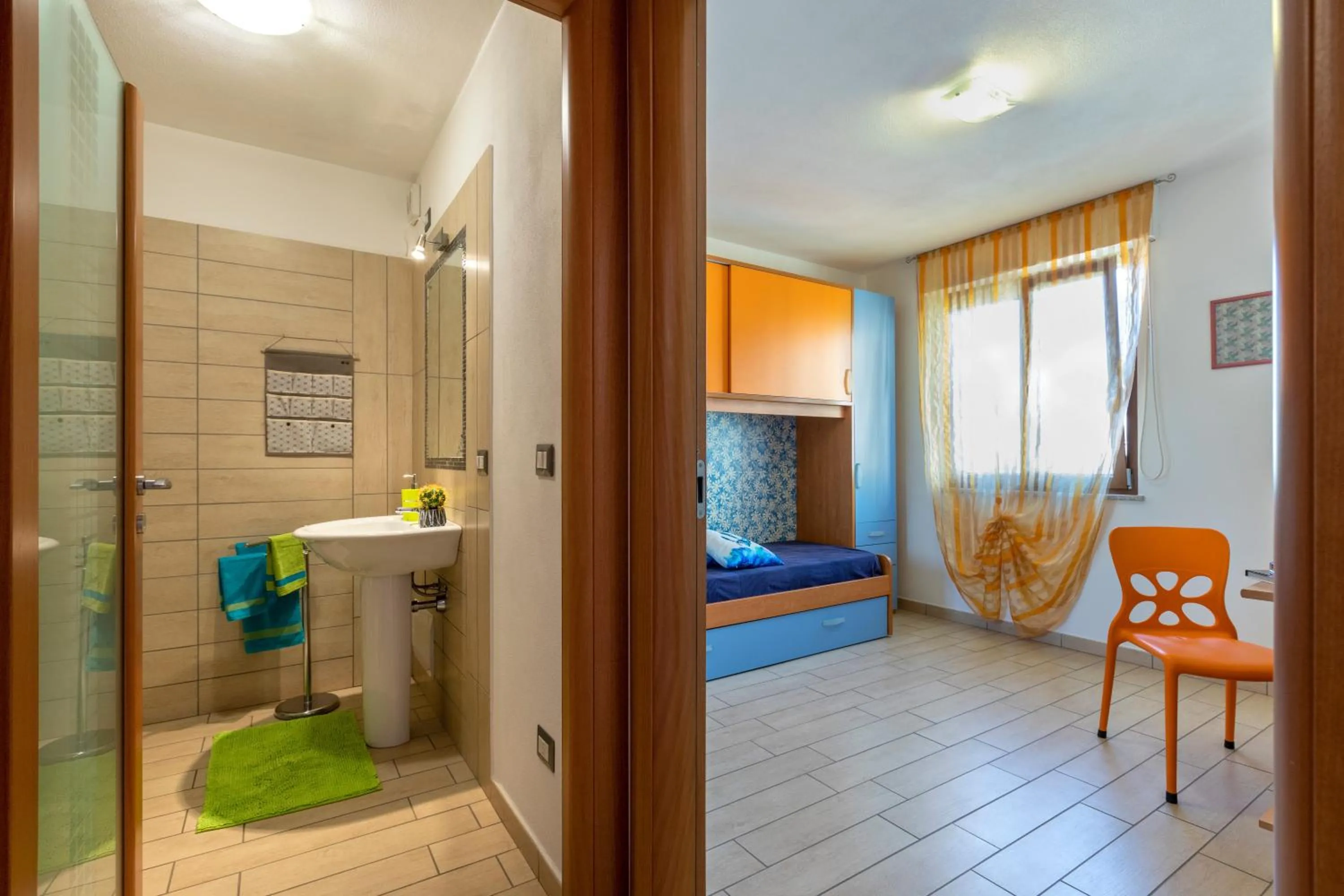 Living room, Bed in Casa vacanze Sardegna il Corbezzolo
