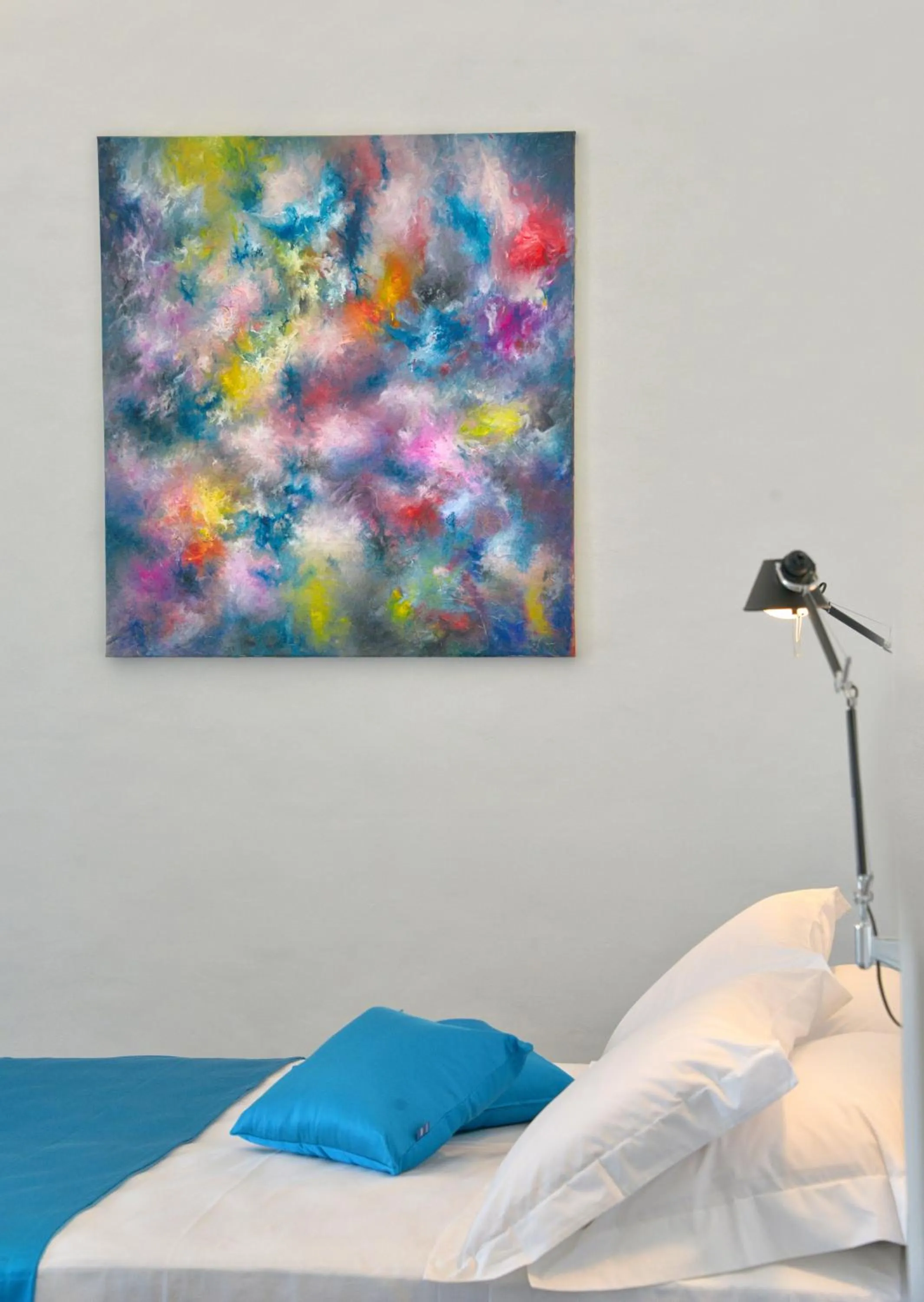 Bed in Sunshine Luxury Rooms