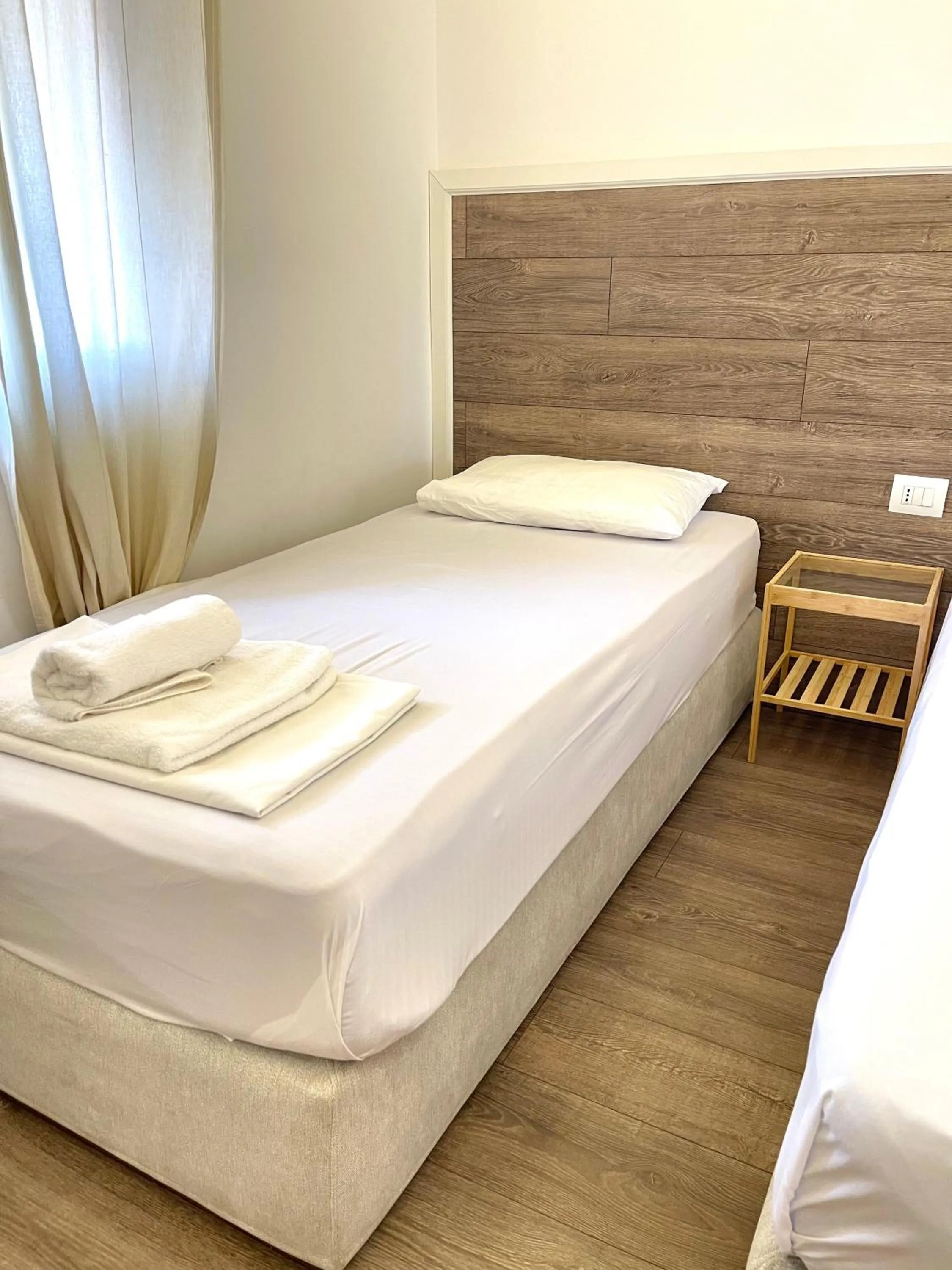 Bed in Hotel Aulona