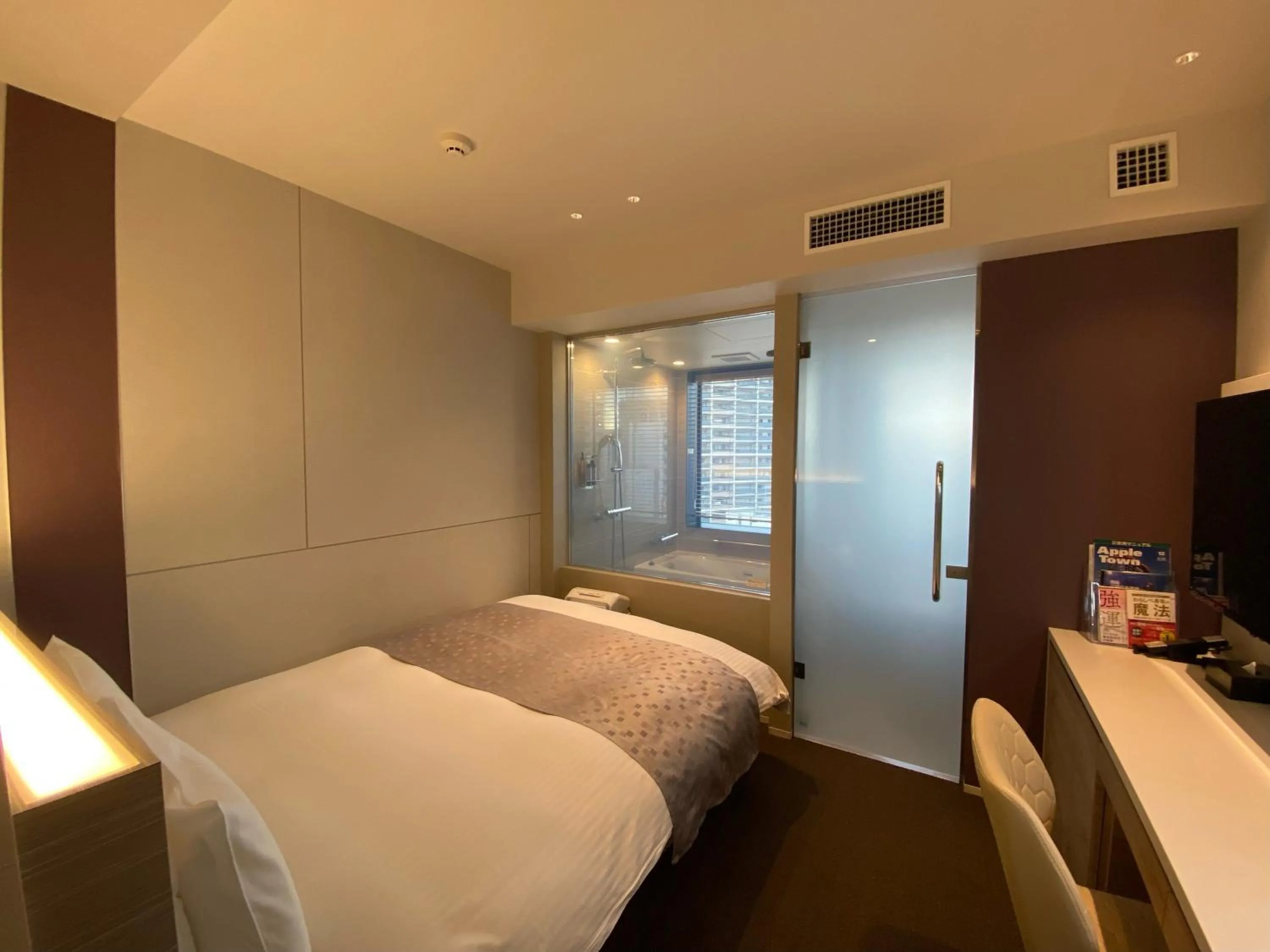 Bed in APA Hotel Keikyukamata Ekimae