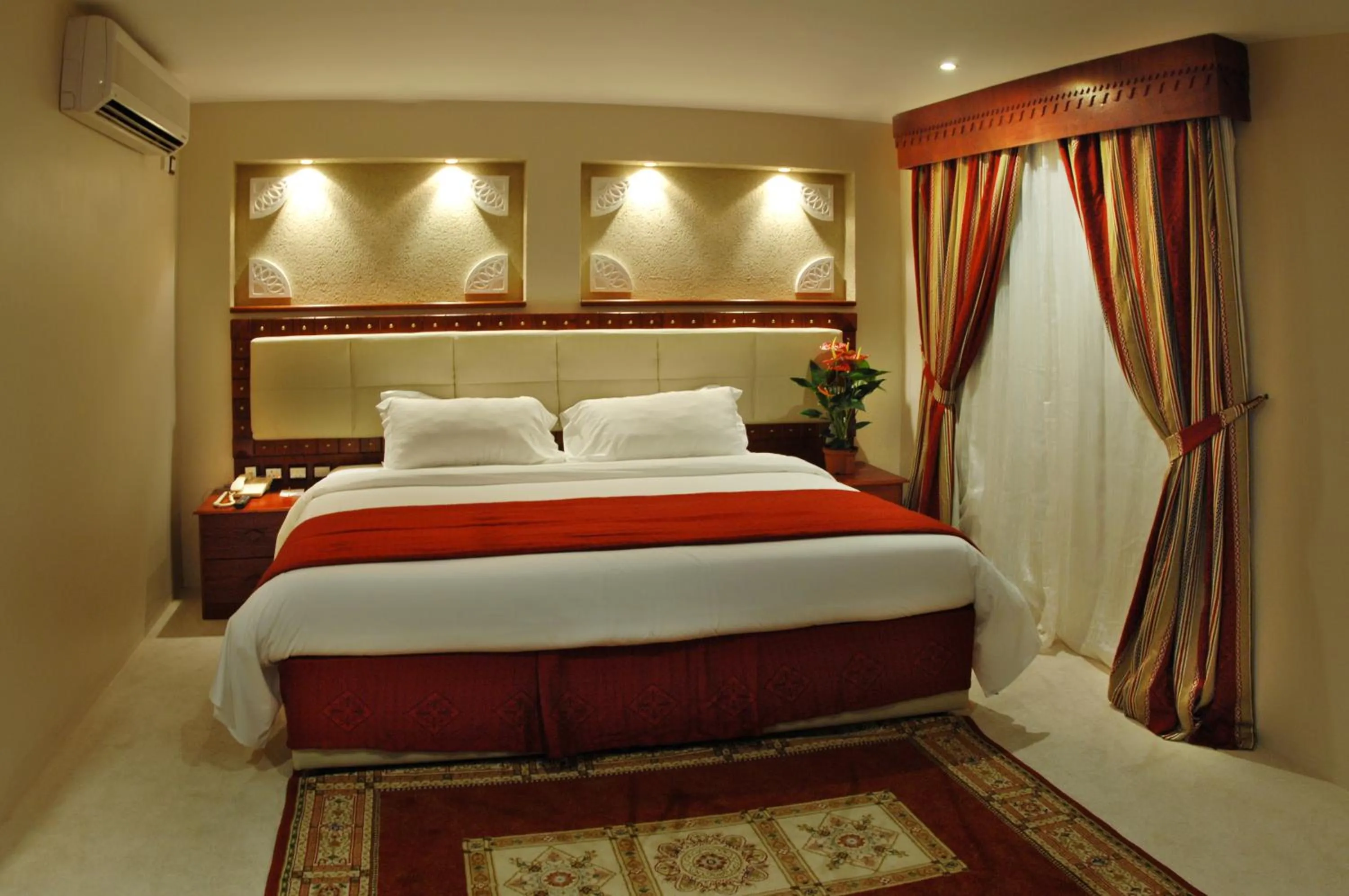 Bed in Al Liwan Suites