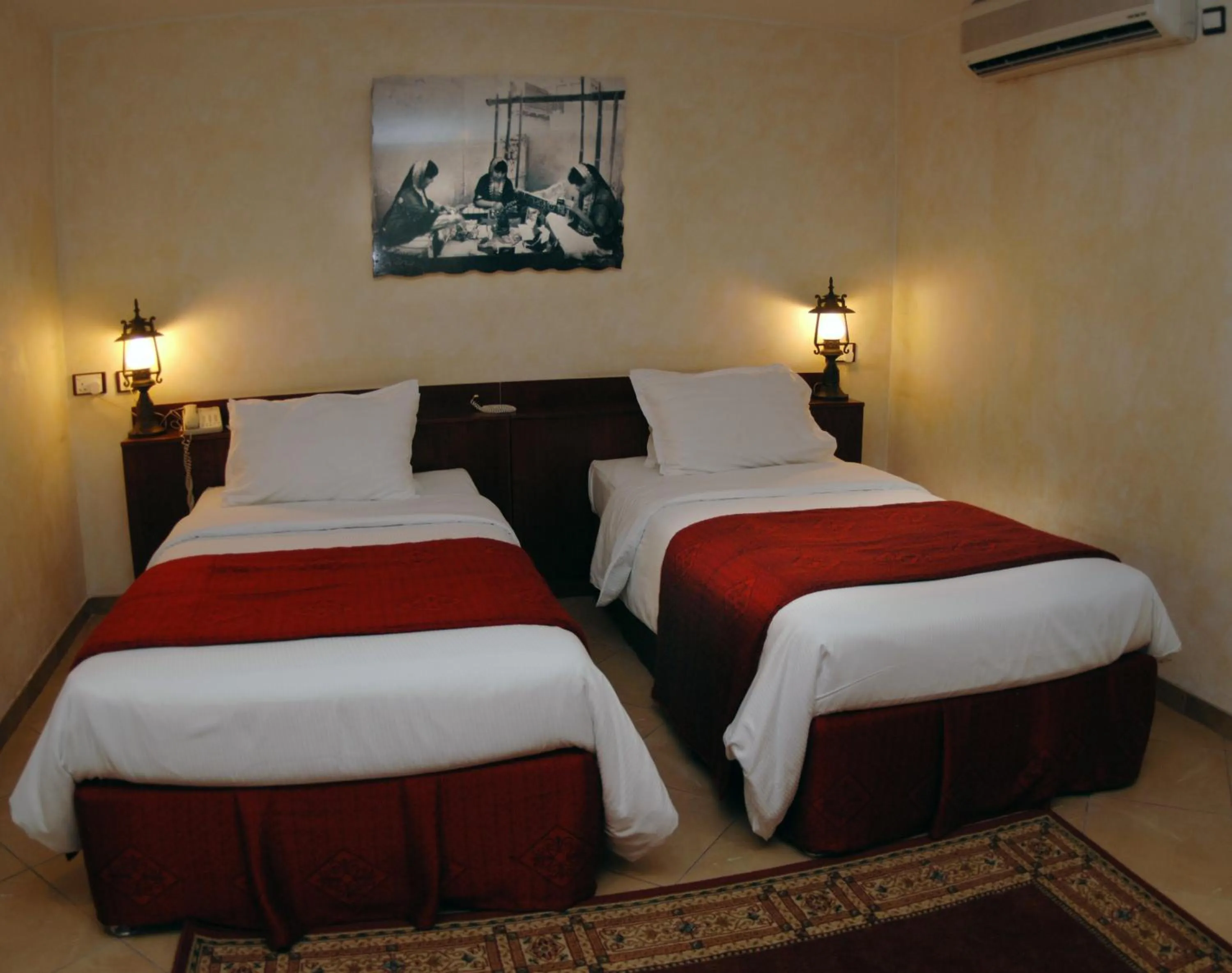 Bed in Al Liwan Suites