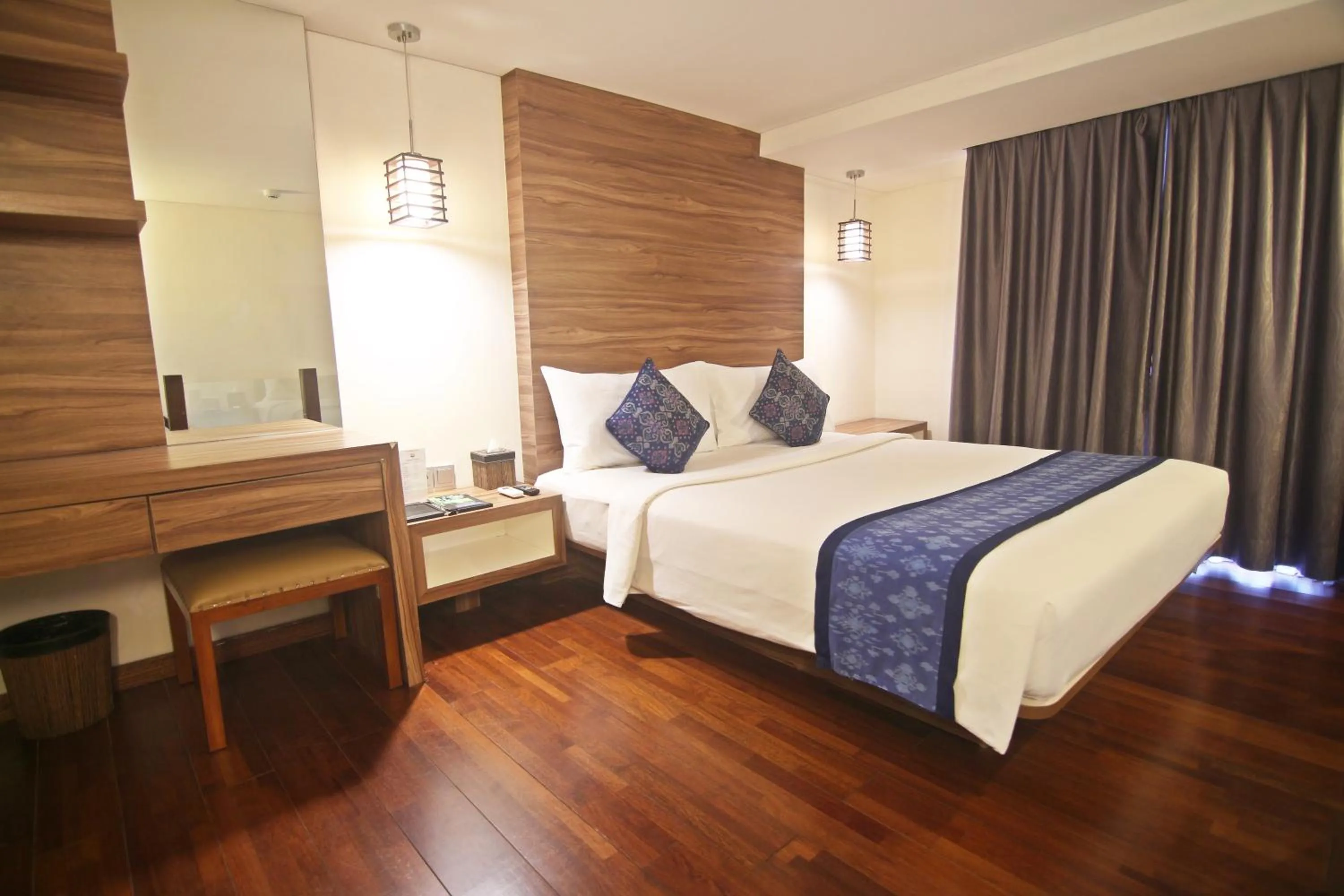 Bed in The Legian Sunset Residence