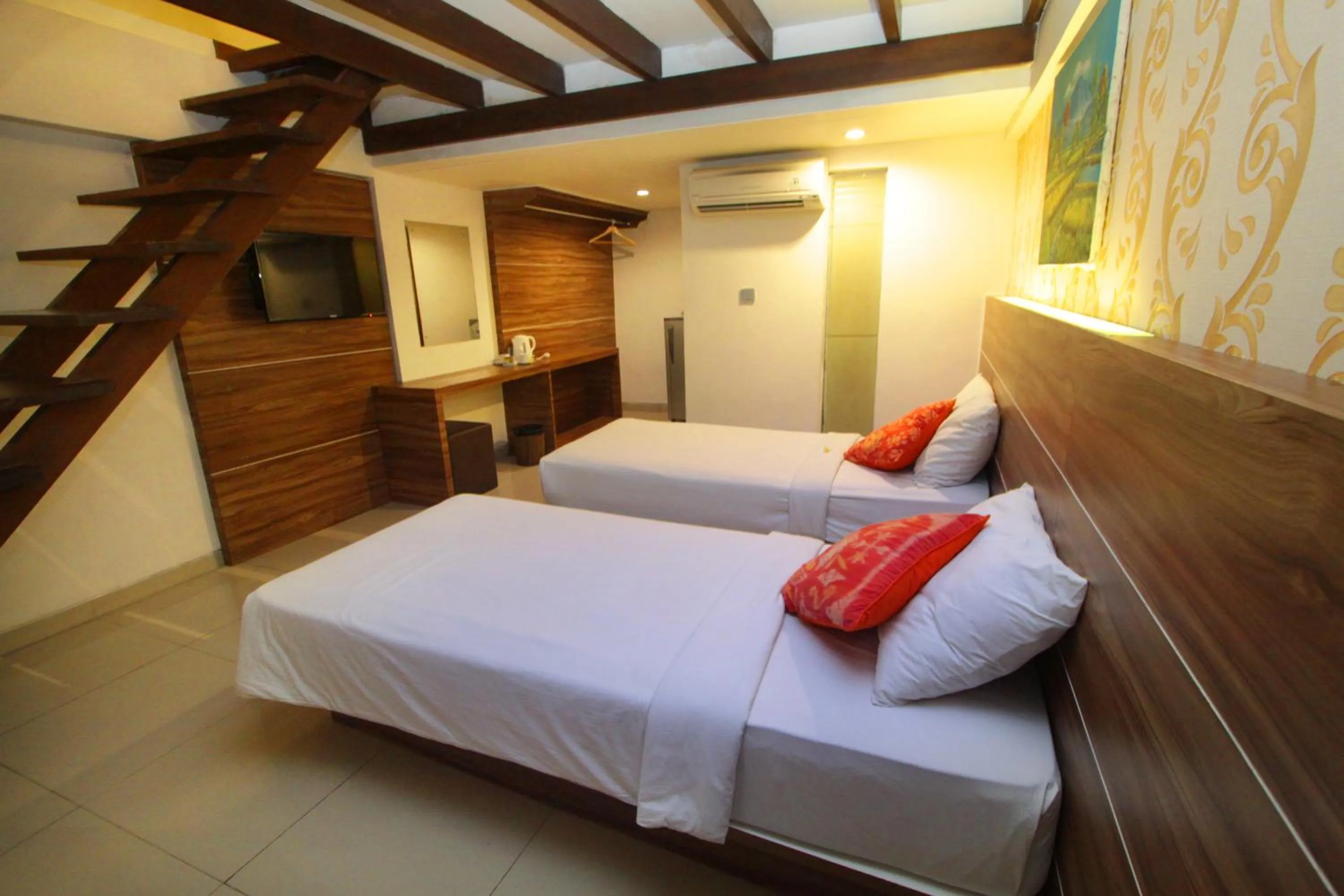 Bed in The Legian Sunset Residence
