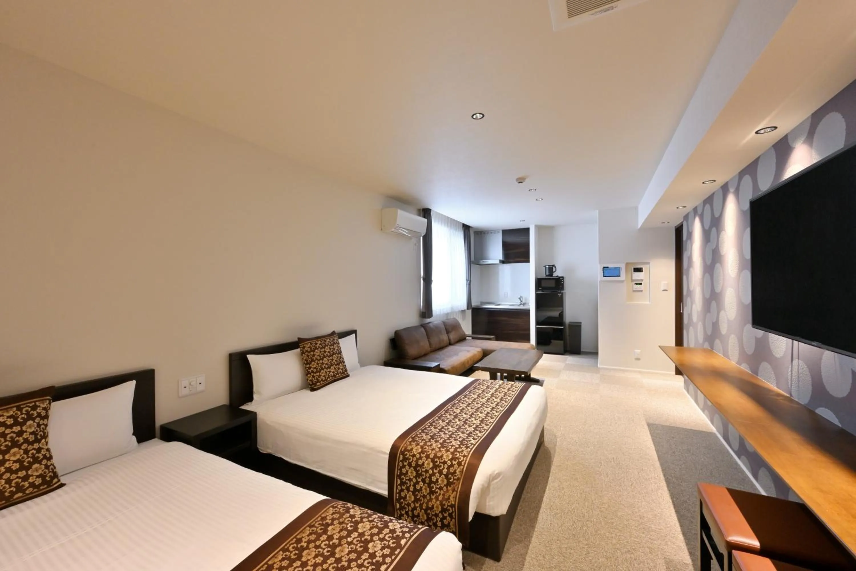 Photo of the whole room, Bed in GRAND BASE Hiroshima Peace Memorial Park