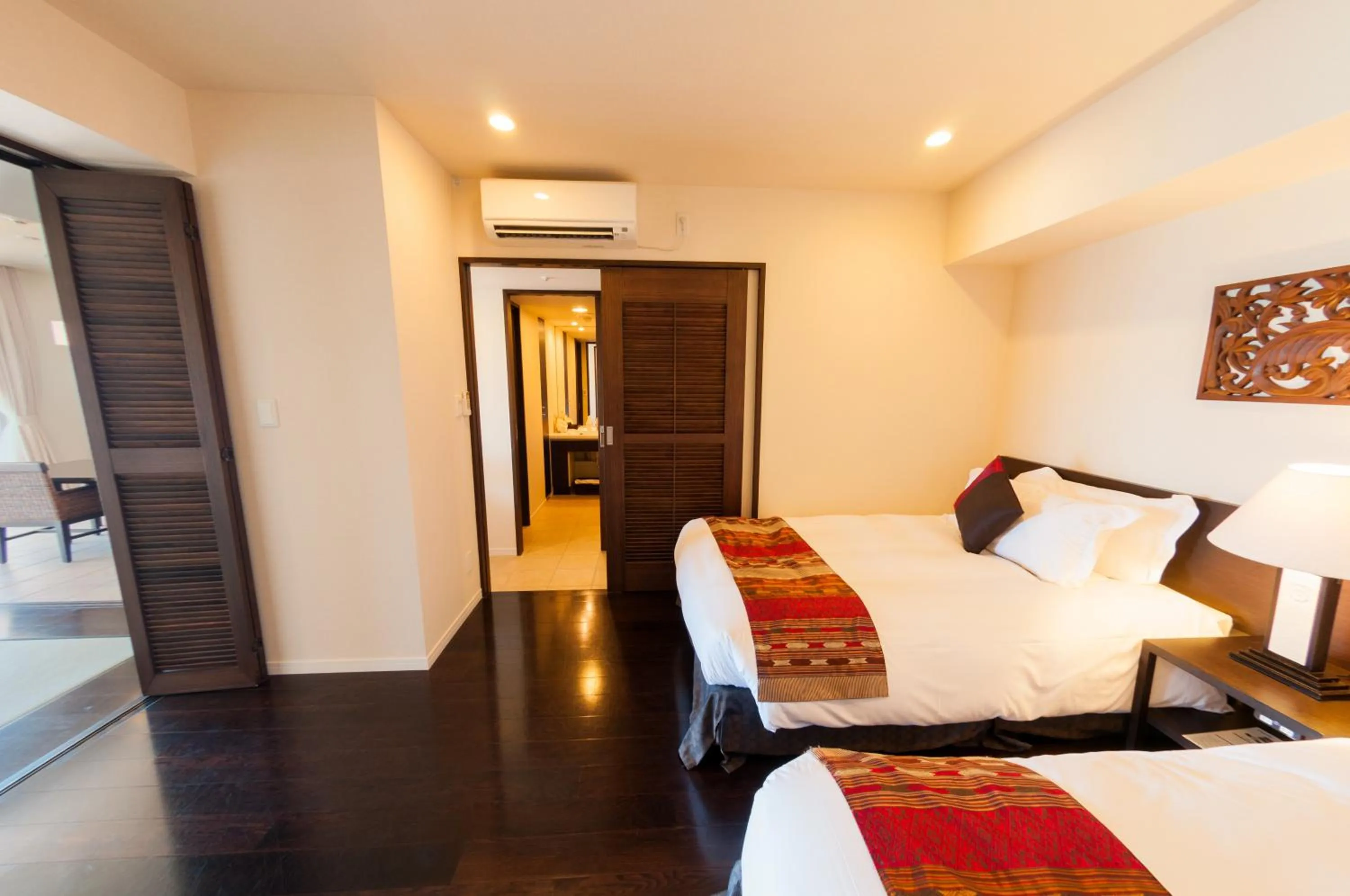 Bedroom, Bed in Kafuu Resort Fuchaku Condo Hotel