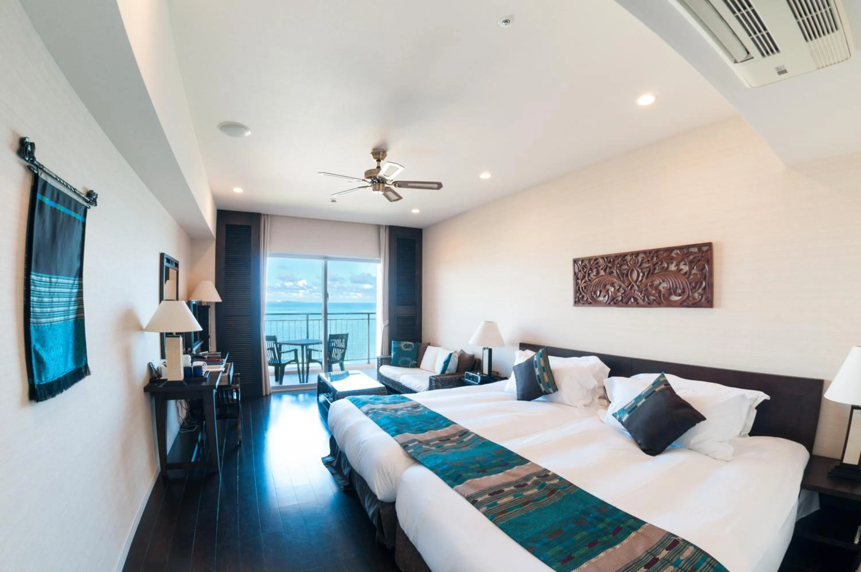 Photo of the whole room, Bed in Kafuu Resort Fuchaku Condo Hotel