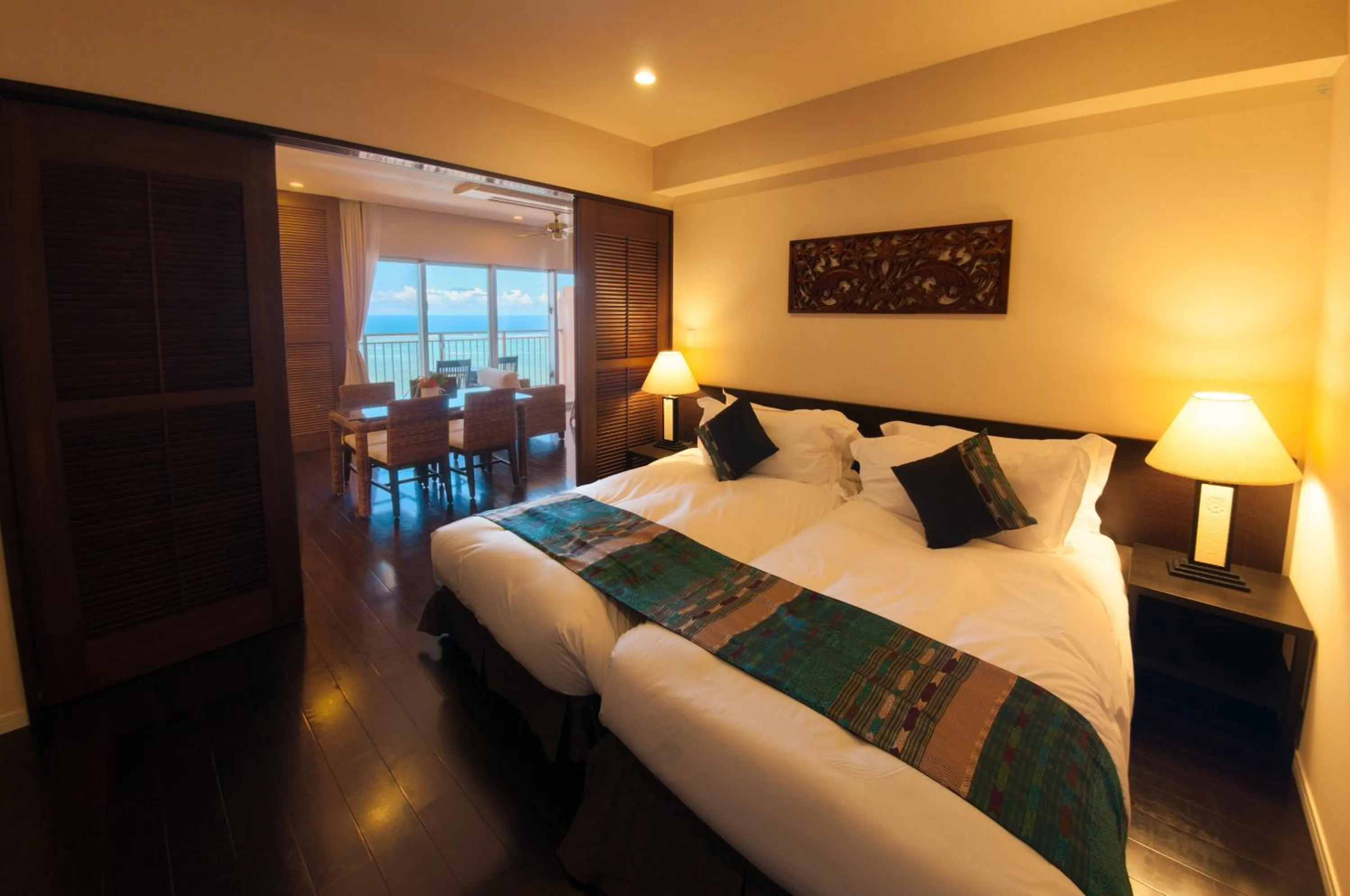 Photo of the whole room, Bed in Kafuu Resort Fuchaku Condo Hotel