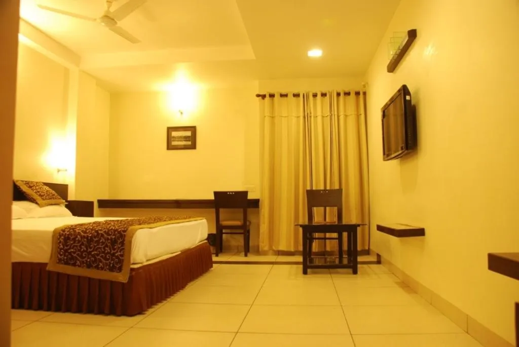 Photo of the whole room, Bed in Grand Ashirwad Beacon