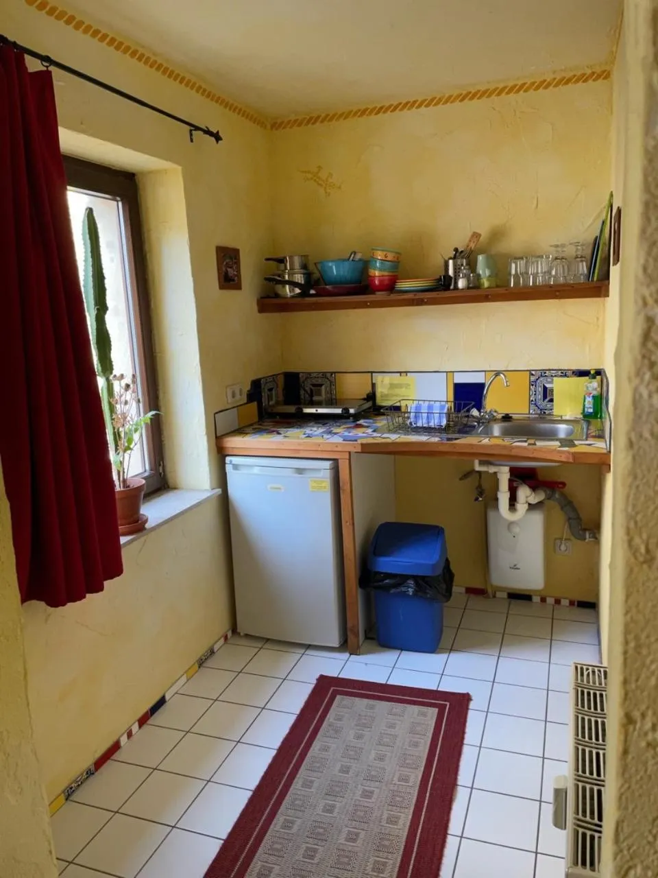 Kitchen or kitchenette in Gästehaus Mezcalero