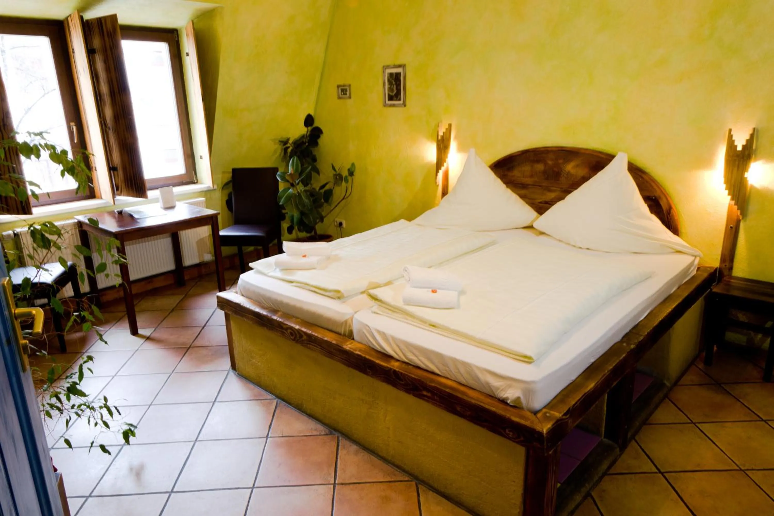 Bed in Gästehaus Mezcalero